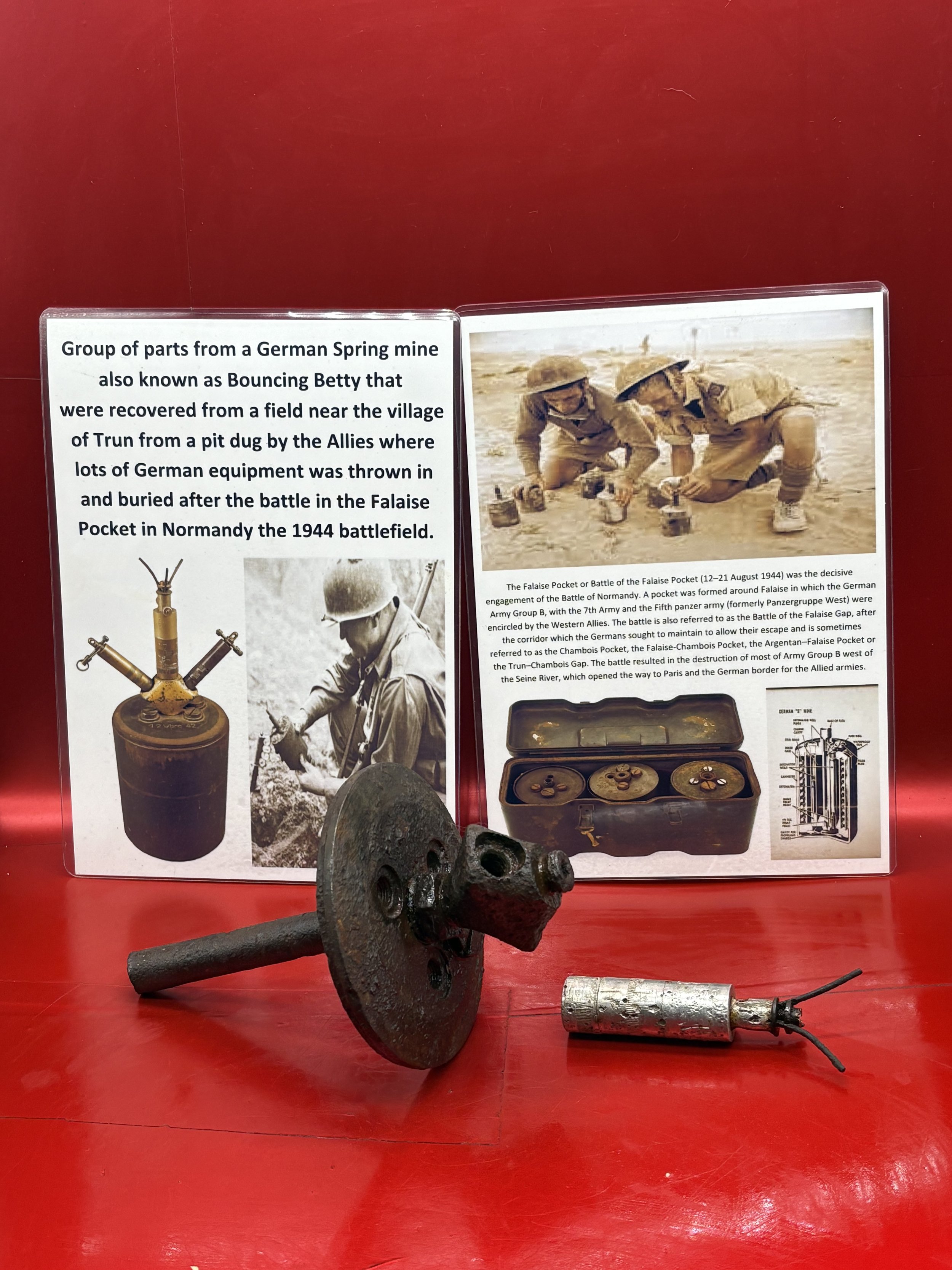 Rare top plate and fuse,maker marked from German Spring mine also known as Bouncing Betty that were recovered from near the village of Trun in the Falaise Pocket, Normandy in 1944