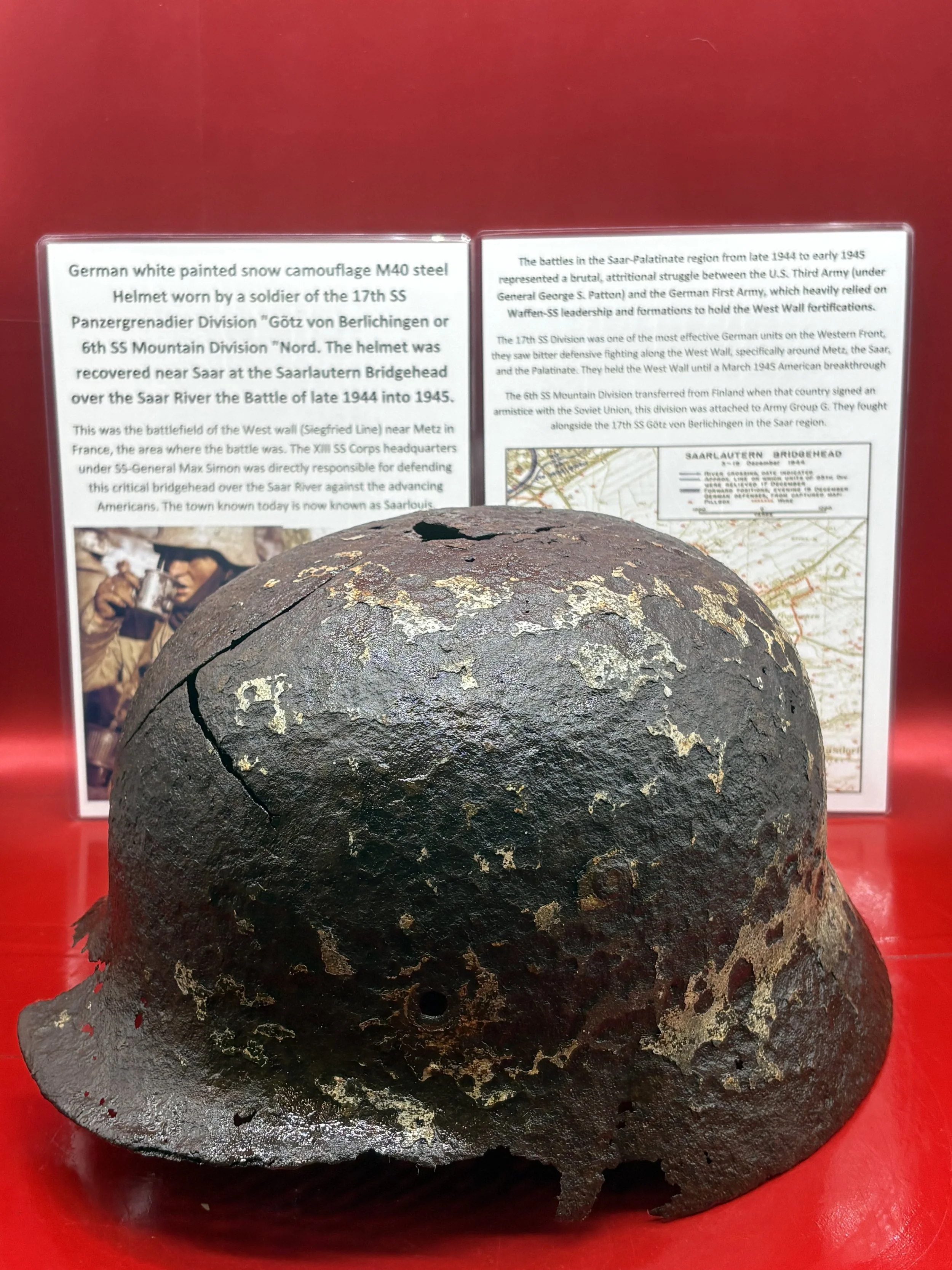 Rare German white painted snow camouflage M40 steel Helmet worn by a soldier of 17th SS Panzergrenadier Division-6th SS Mountain Division "Nord,recovered at Saarlautern Bridgehead,France 1944-45