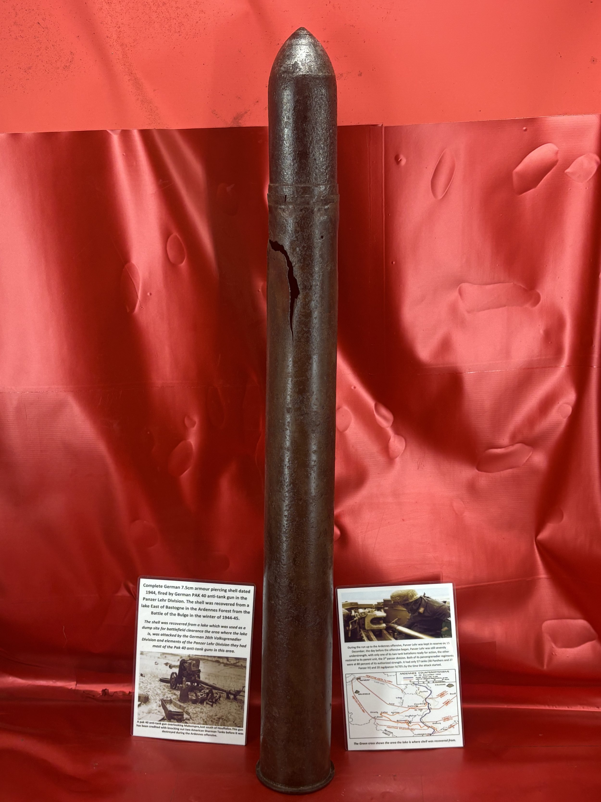Complete nice German 7.5cm armour piercing shell dated 1944, fired by German PAK 40 anti-tank gun in the Panzer Lehr Division recovered from a lake East of Bastogne in the Ardennes Forest 1944-45