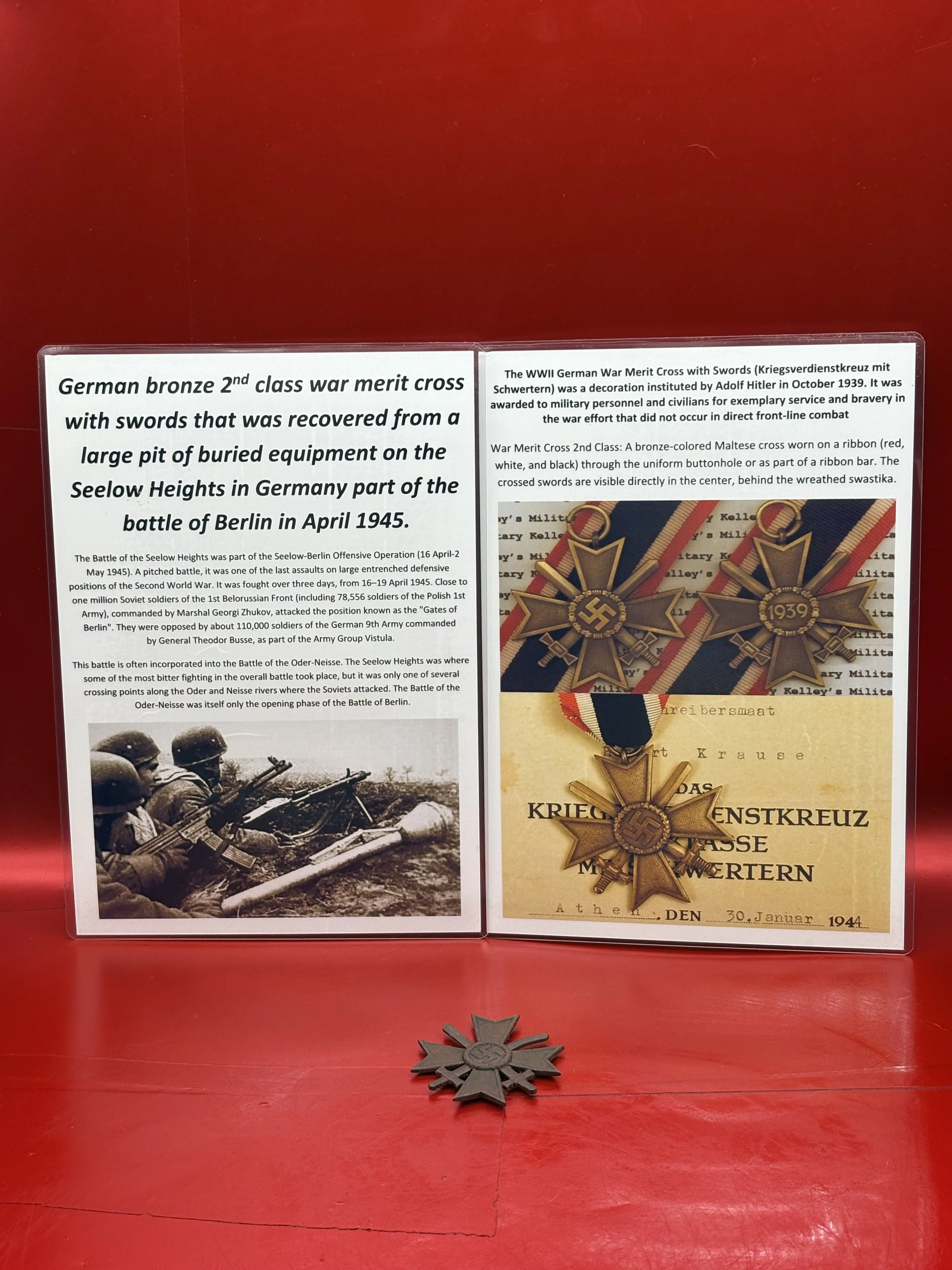 Very rare German bronze 2nd class war merit cross with swords that was recovered from a large pit of buried equipment on the Seelow Heights in Germany part of the battle of Berlin in April 1945.