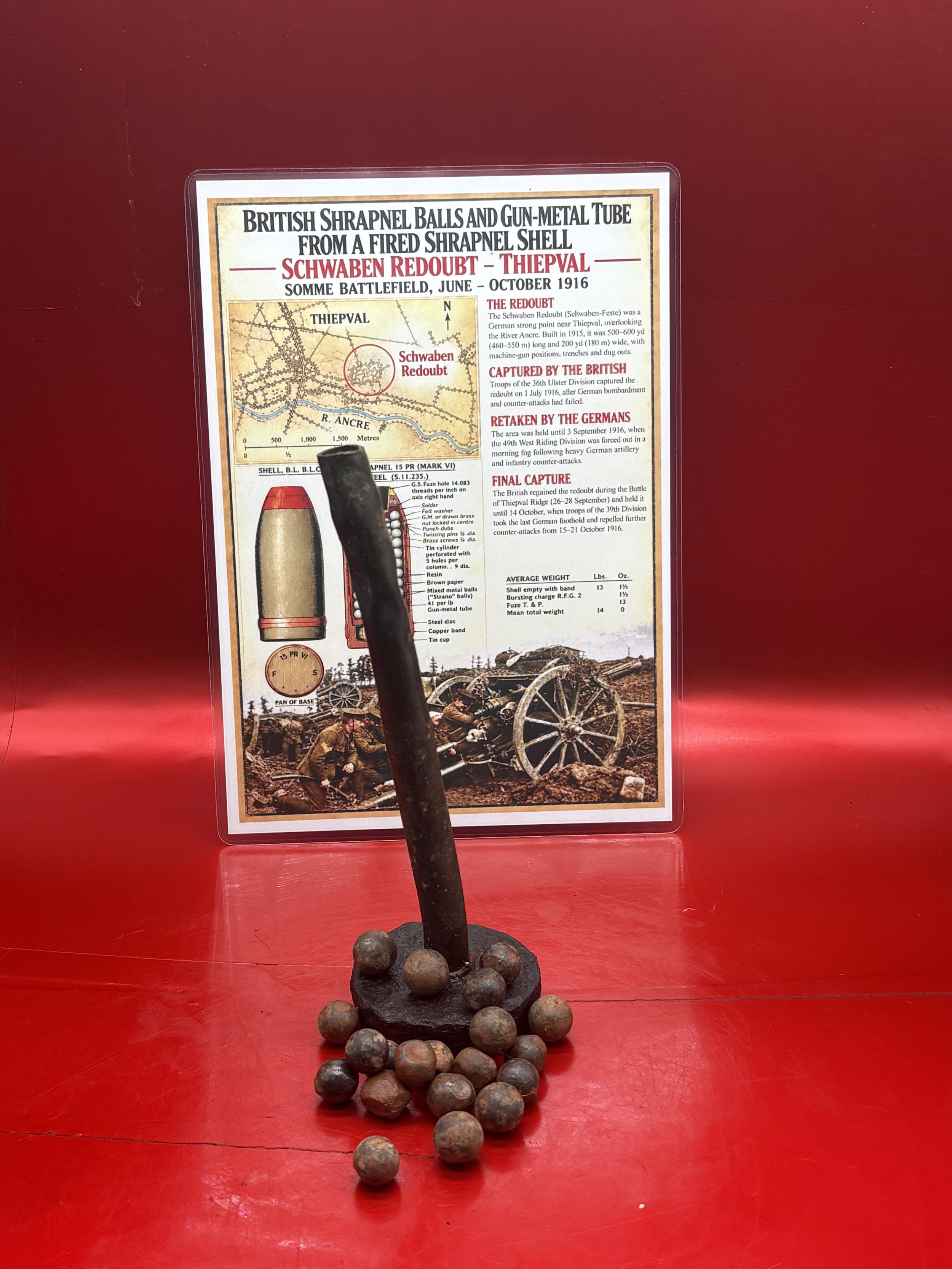British shrapnel balls and brass centre tube from a fired shrapnel shell that were all recovered from the area of the Schwaben Redoubt near Thiepval on the Somme Battlefield of June to October 1916.