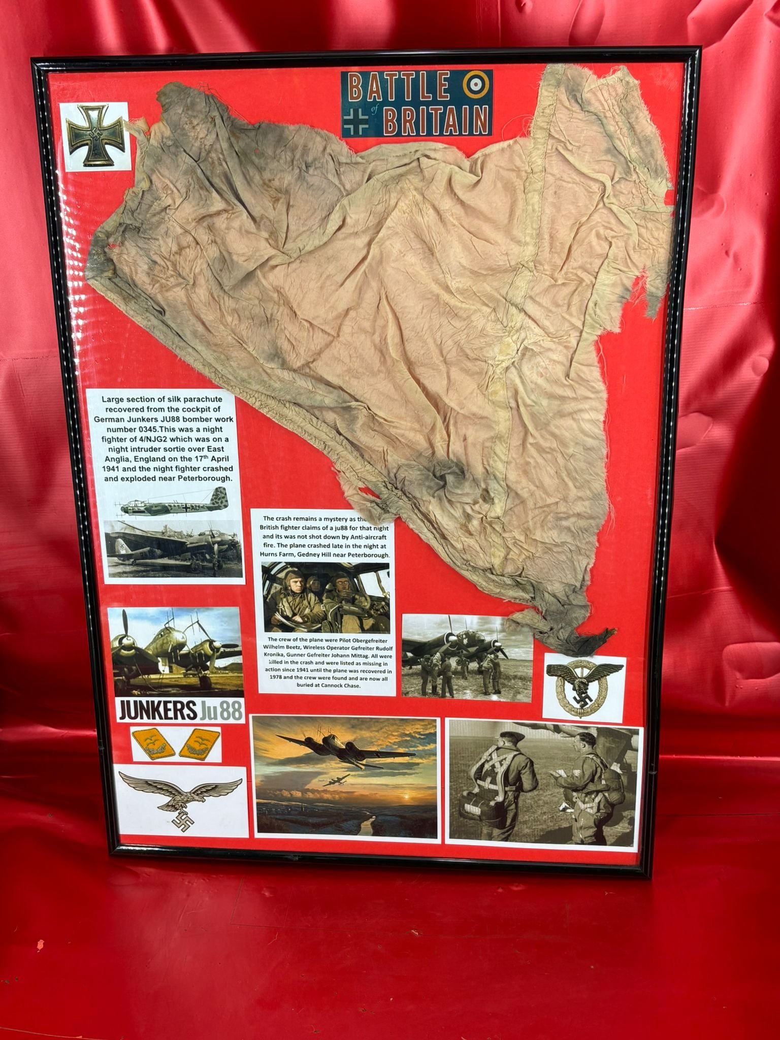 Perspex framed very large section of silk parachute recovered from the cockpit of German Junkers JU88 bomber work number 0345 of 4/NJG2 on night intruder raid on 17th April 1941,crashed Peterborough