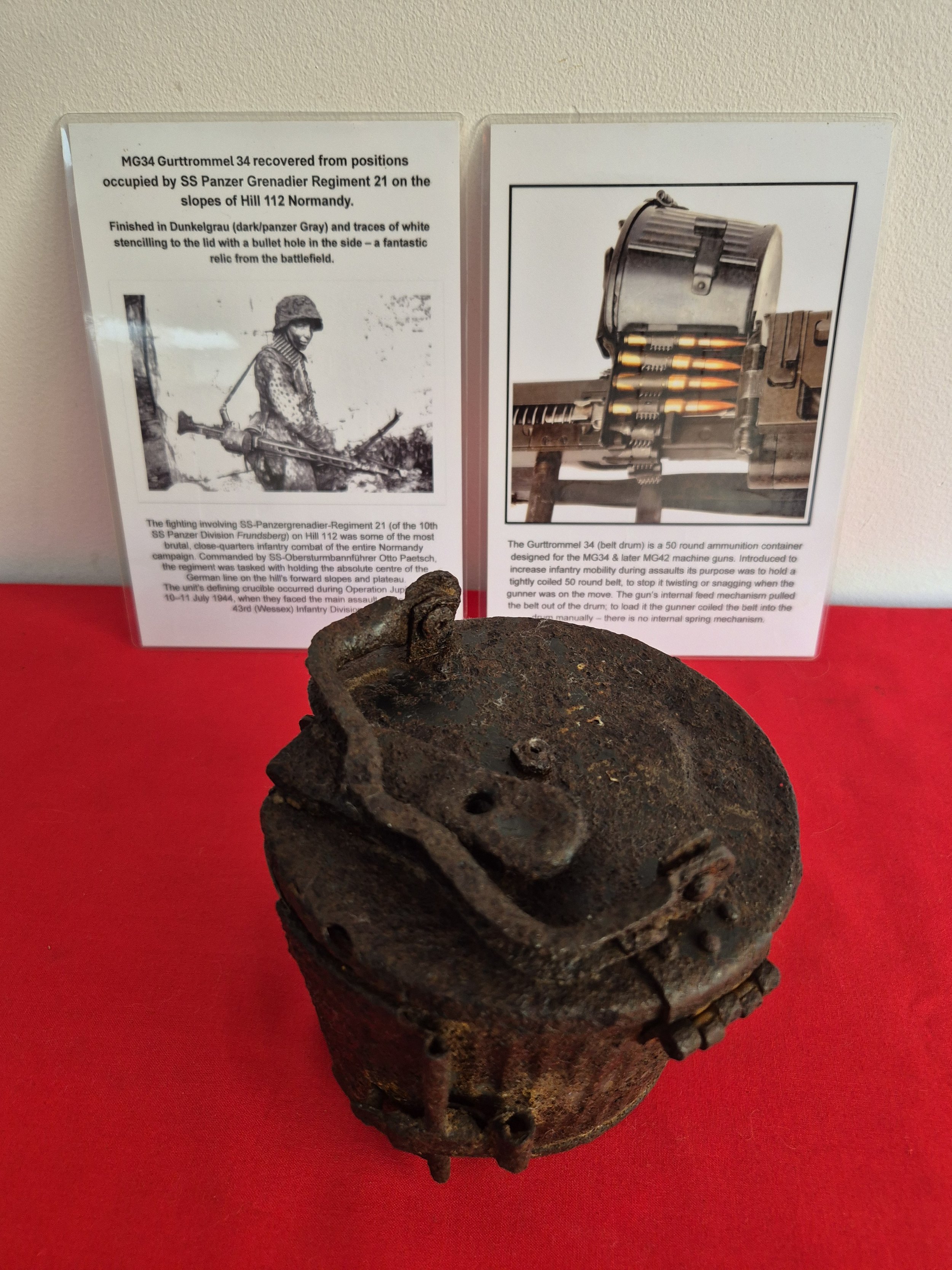 MG34 Gurttrommel 34 recovered from positions occupied by SS Panzer Grenadier Regiment 21 on the slopes of Hill 112 Normandy.
