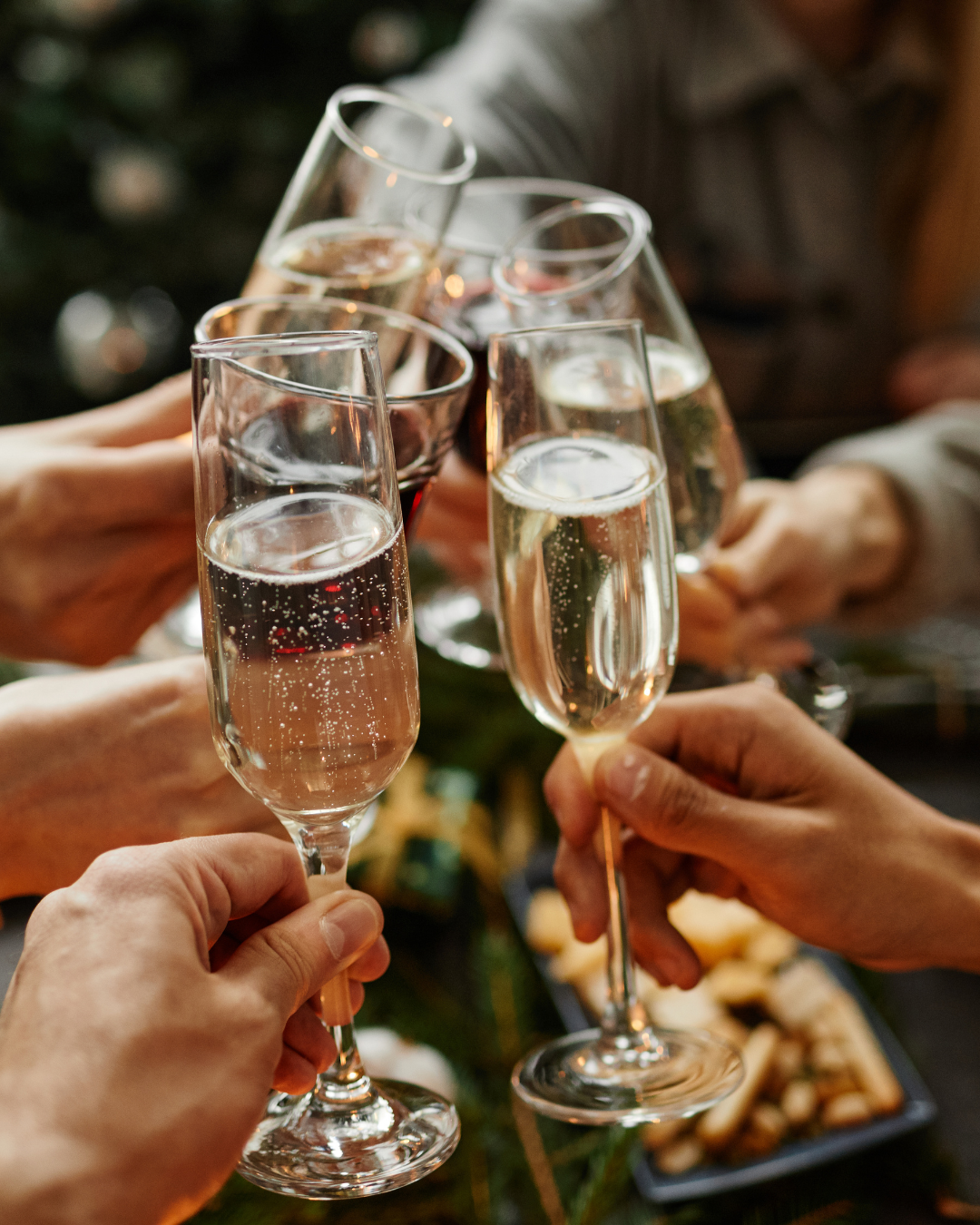 Champagne toast among travelers celebrating a curated luxury experience with Legacy Reserve Travel.