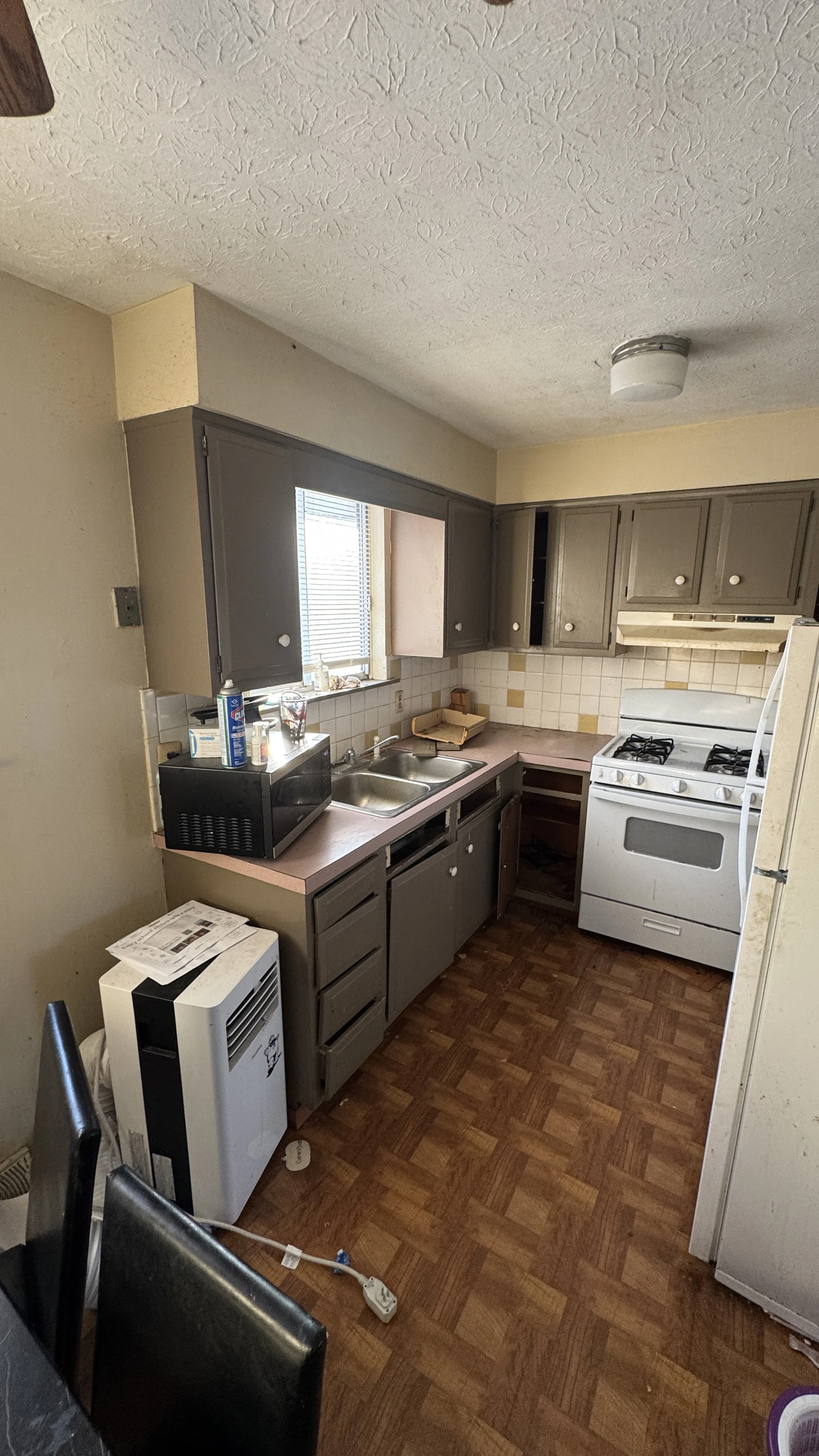 Before photo - dated kitchen in Canton Ohio home prior to remodel