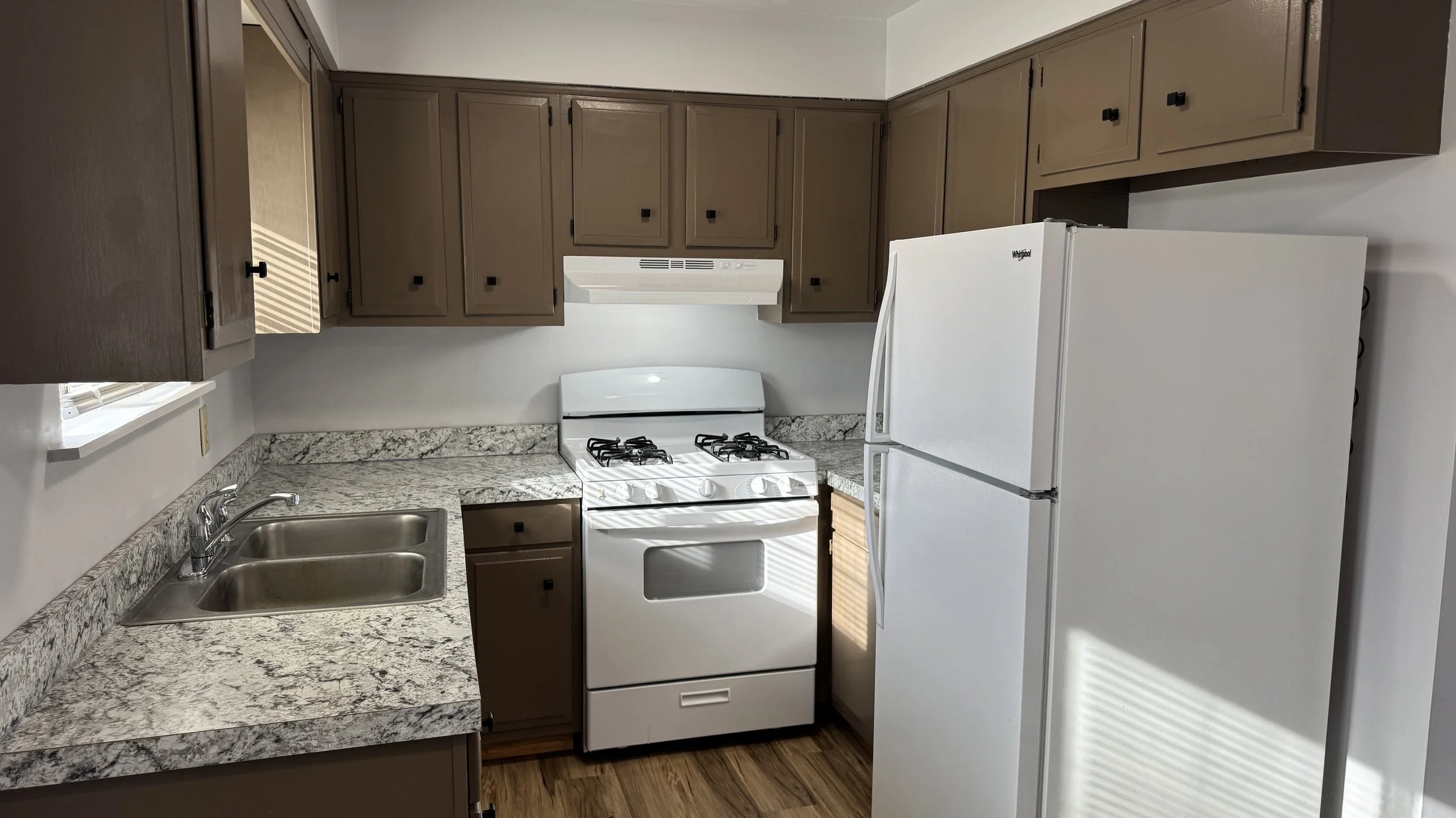 After Photo - Kitchen remodel in Canton Ohio, facelift on cabinets, new countertops & flooring