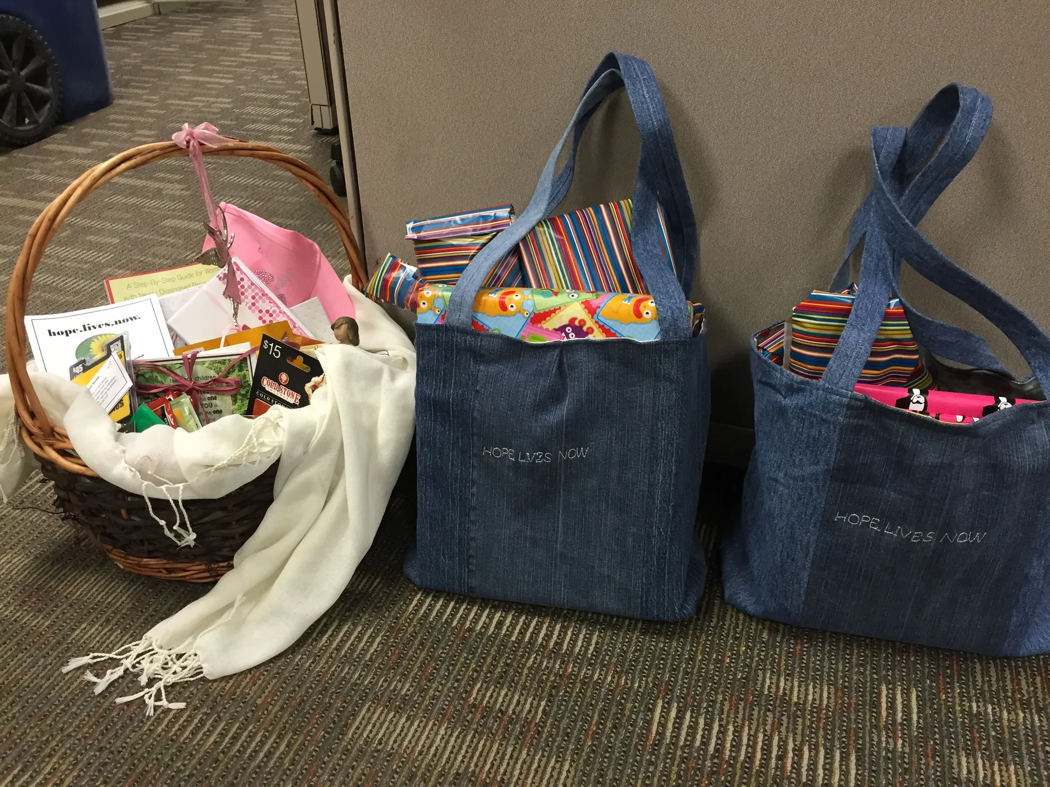 hope lives now hope baskets and blue bags filled with small gifts