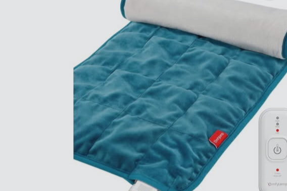 A heated blanket with a blue quilted side and control switch.