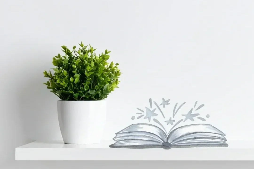 plant with book with stars shooting out of book representing dreams