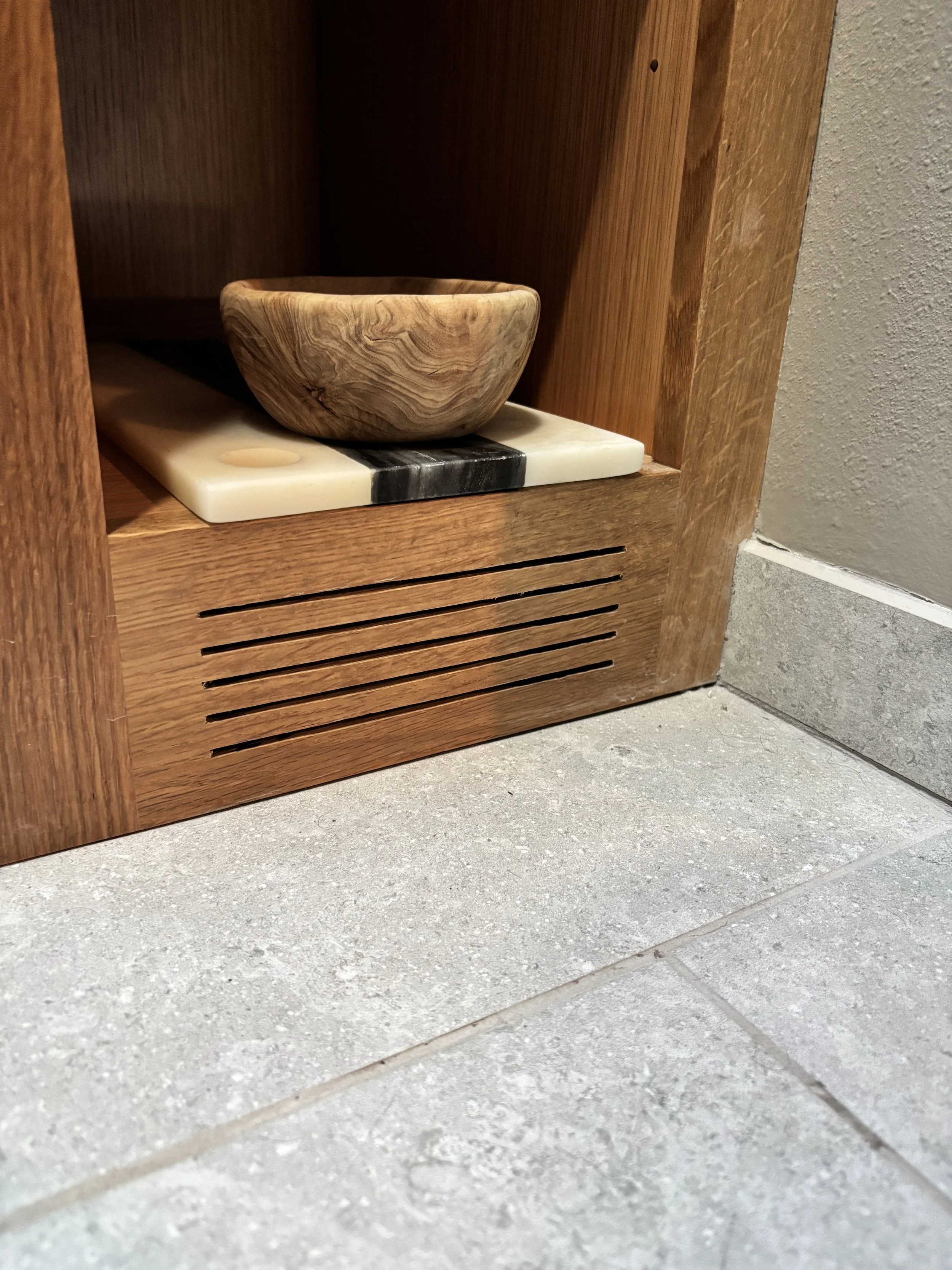 Integrated floor vent in cabinet.jpg