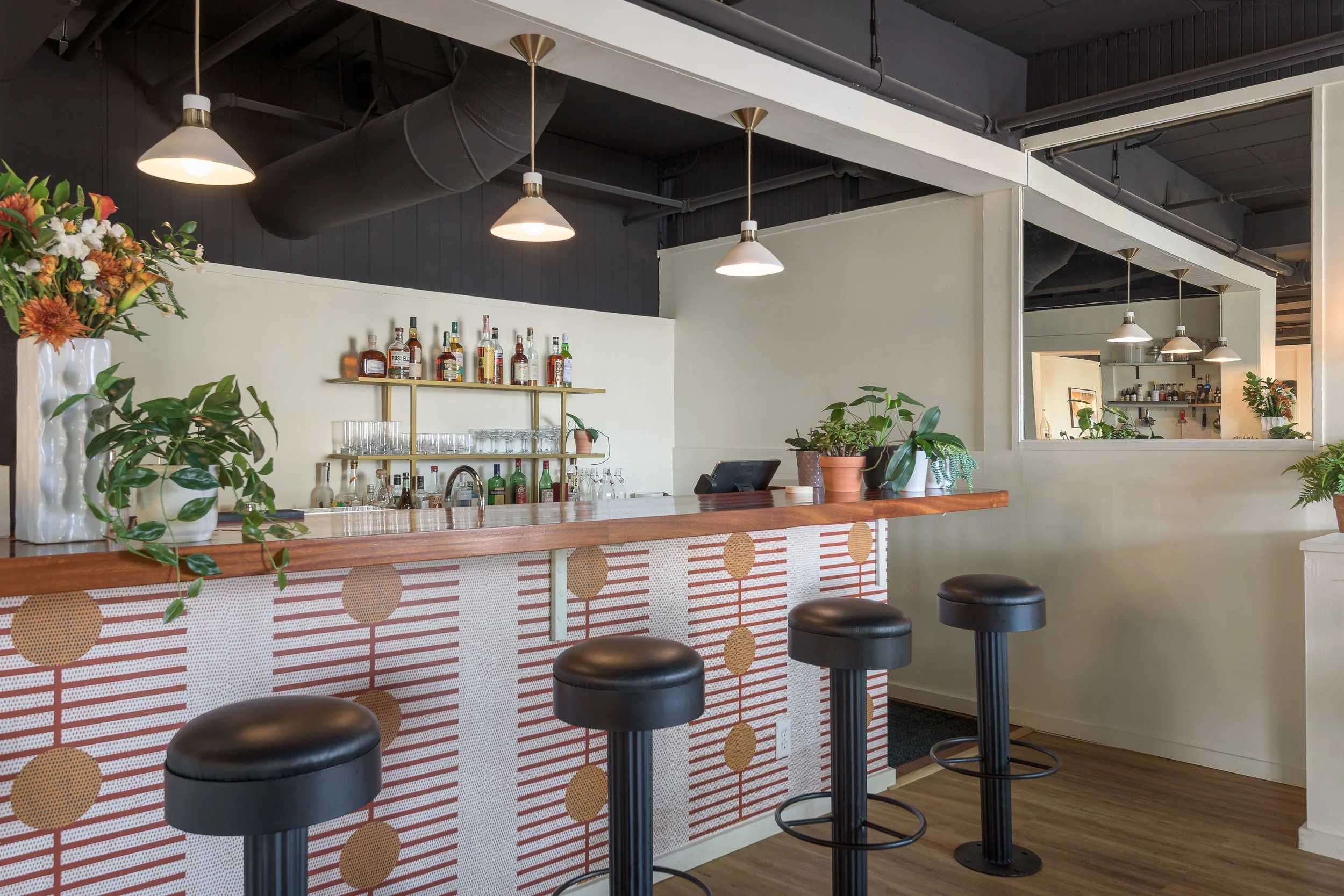 Diners at the bar seating at Domek restaurant can watch the signature cocktails being made