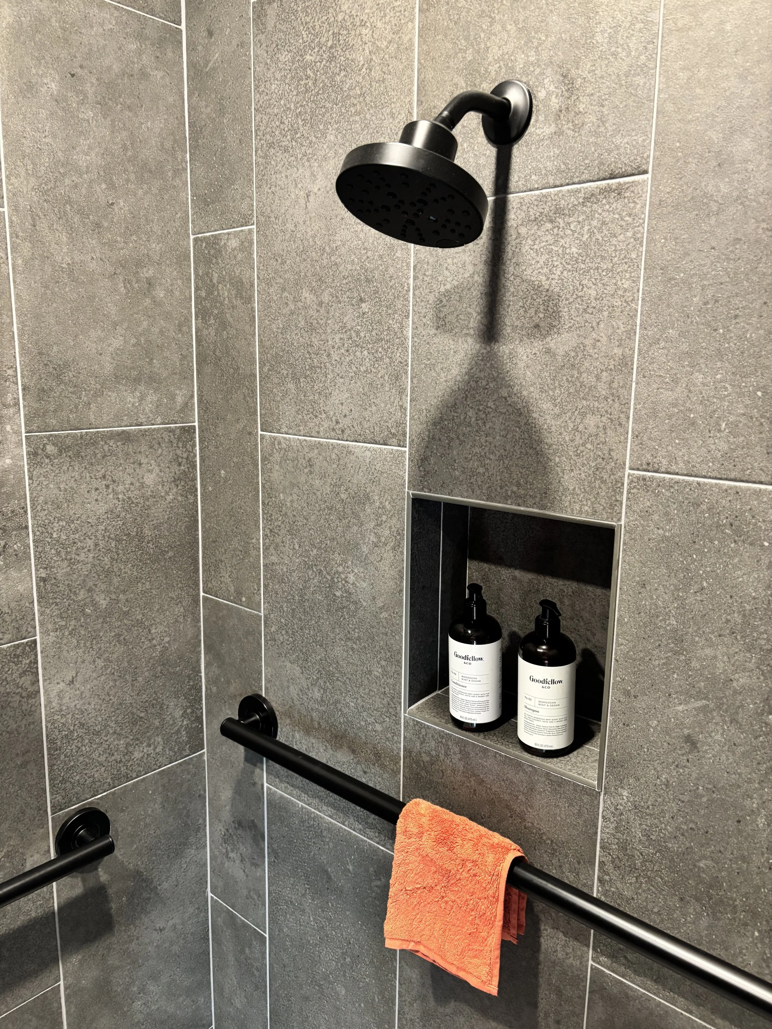 shower tile close up with grab bars.jpg