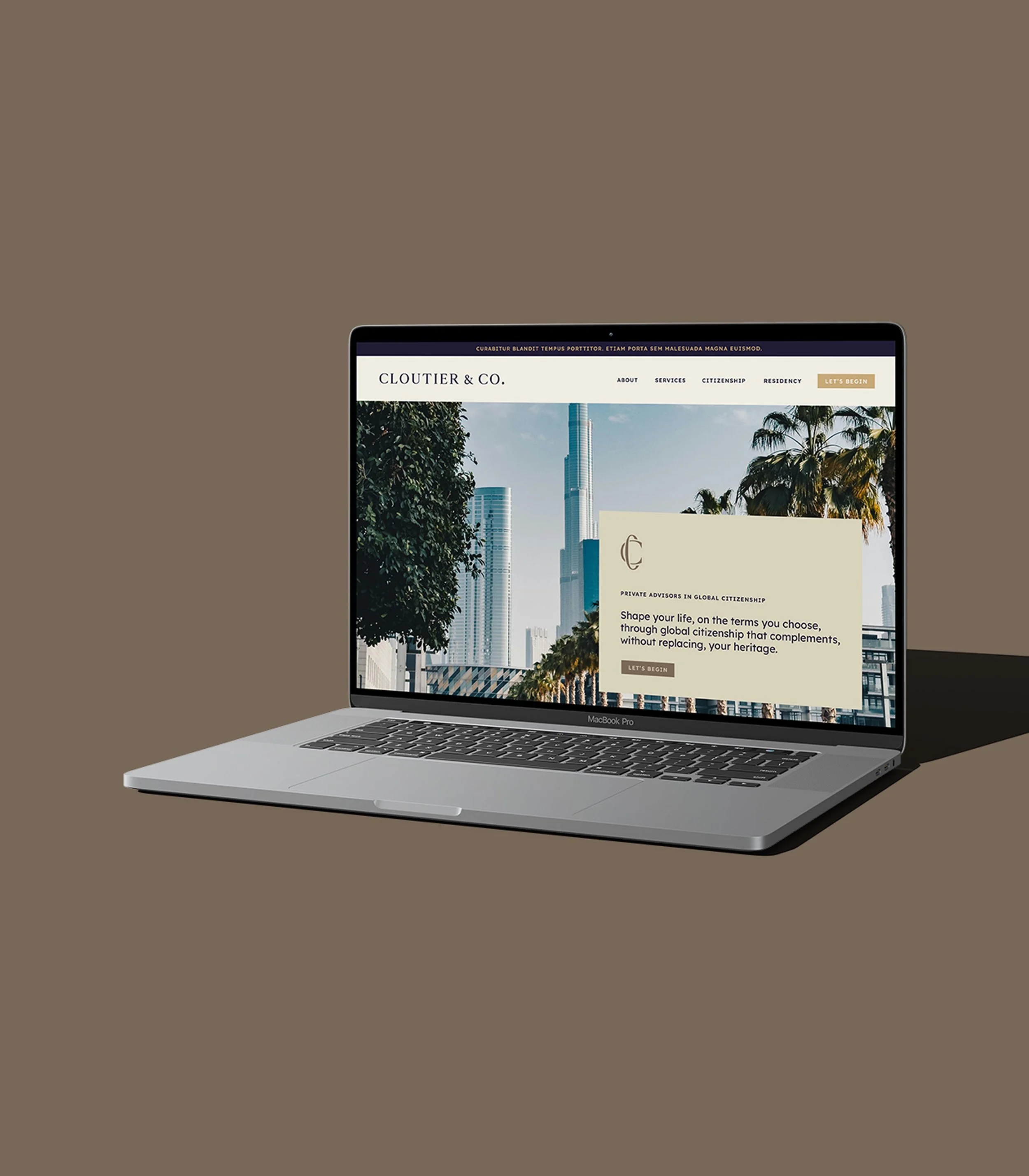 Cloutier & Co. website design on a laptop computer