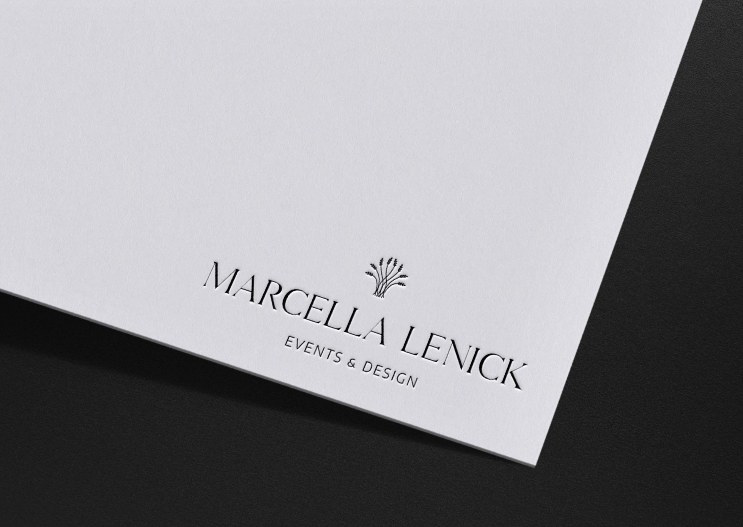 Marcella Lenick logo embossed on card stock
