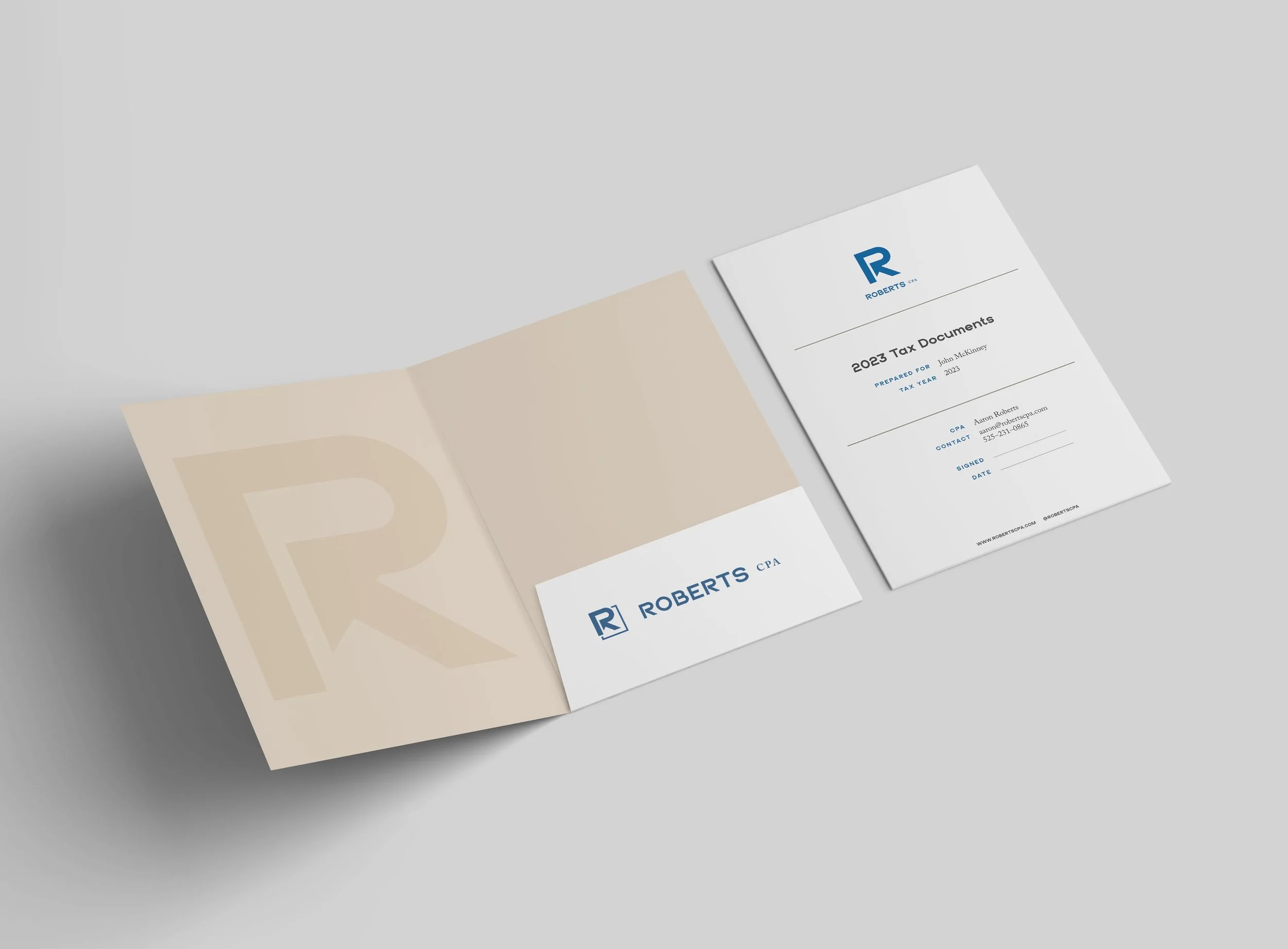 tax documents and folder printed with Roberts CPA branding