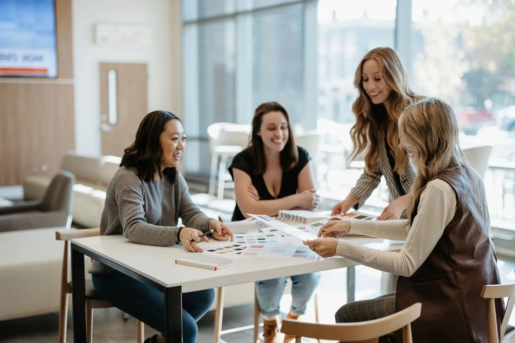 brand designers looking at color swatches