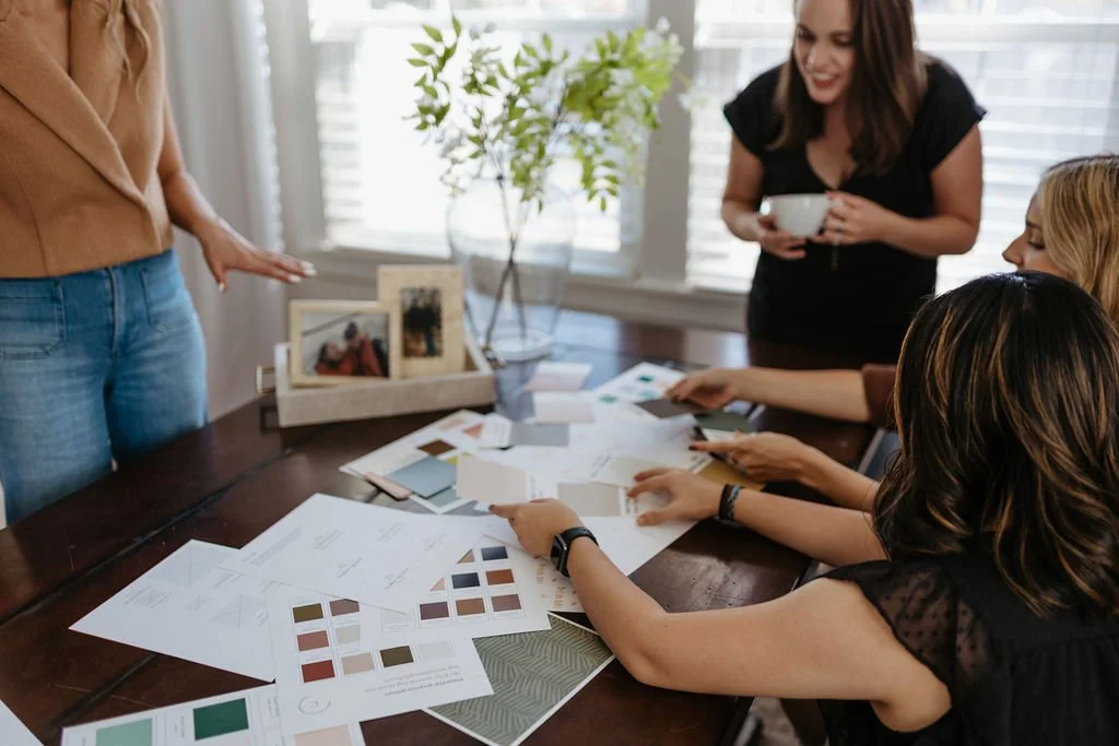 brand designers looking at color swatches