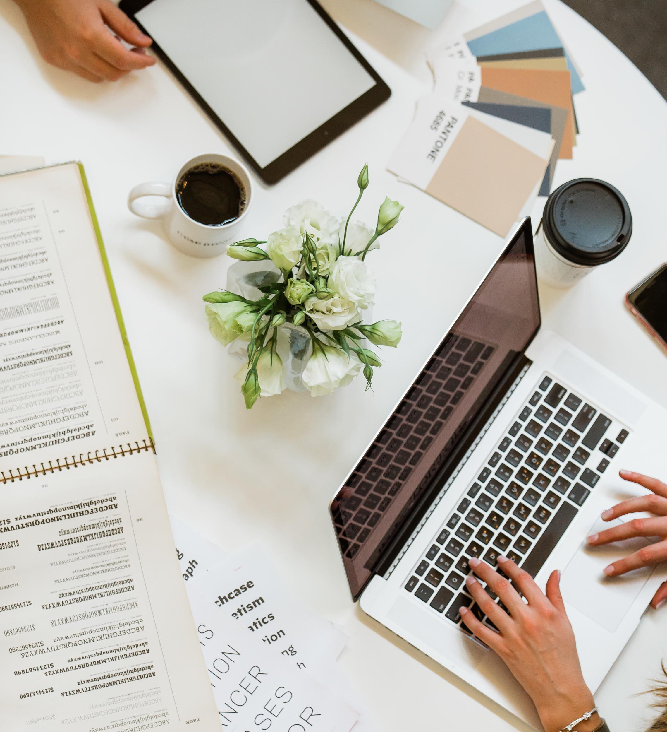 brand designer working at a laptop