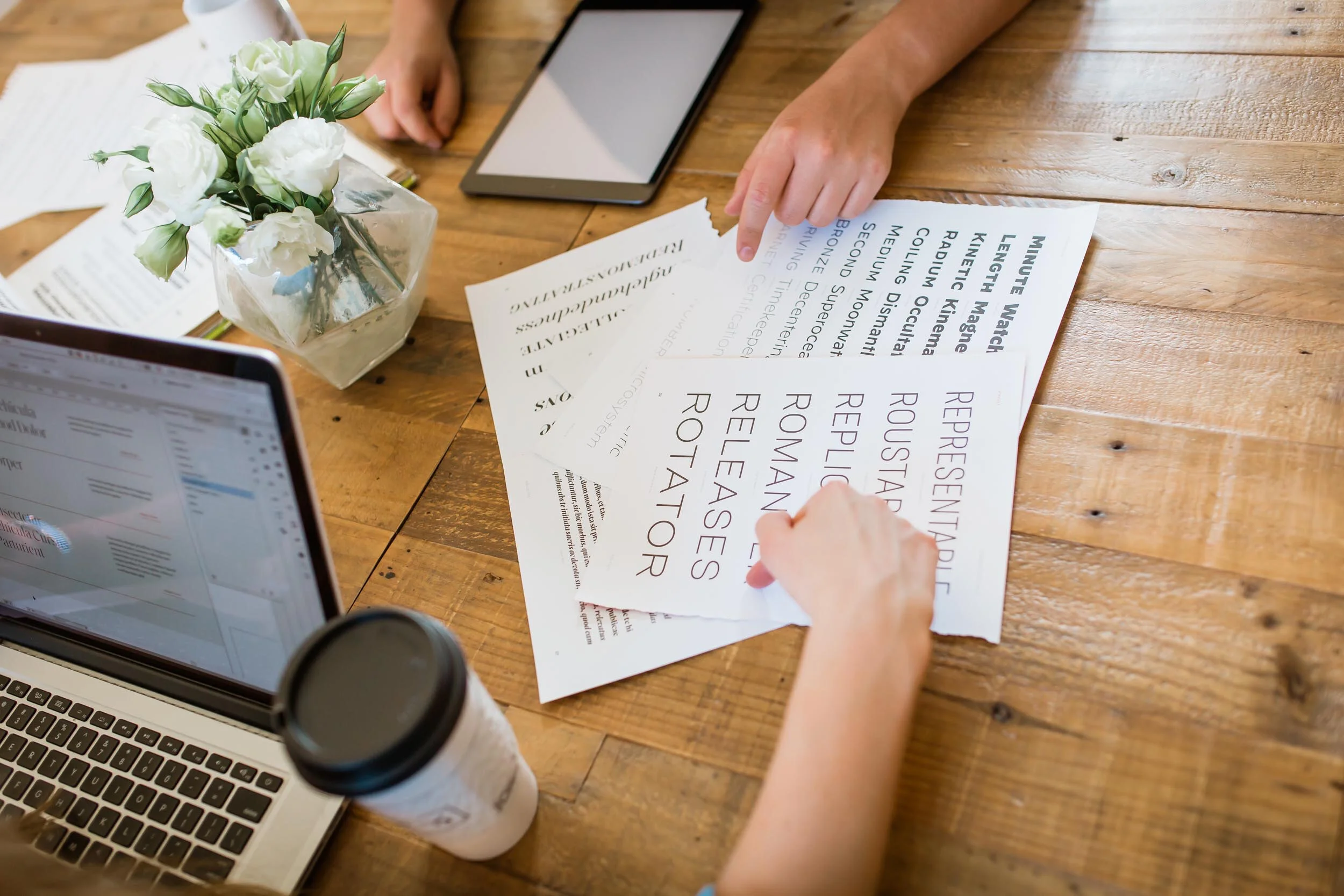 brand designers looking at font samples