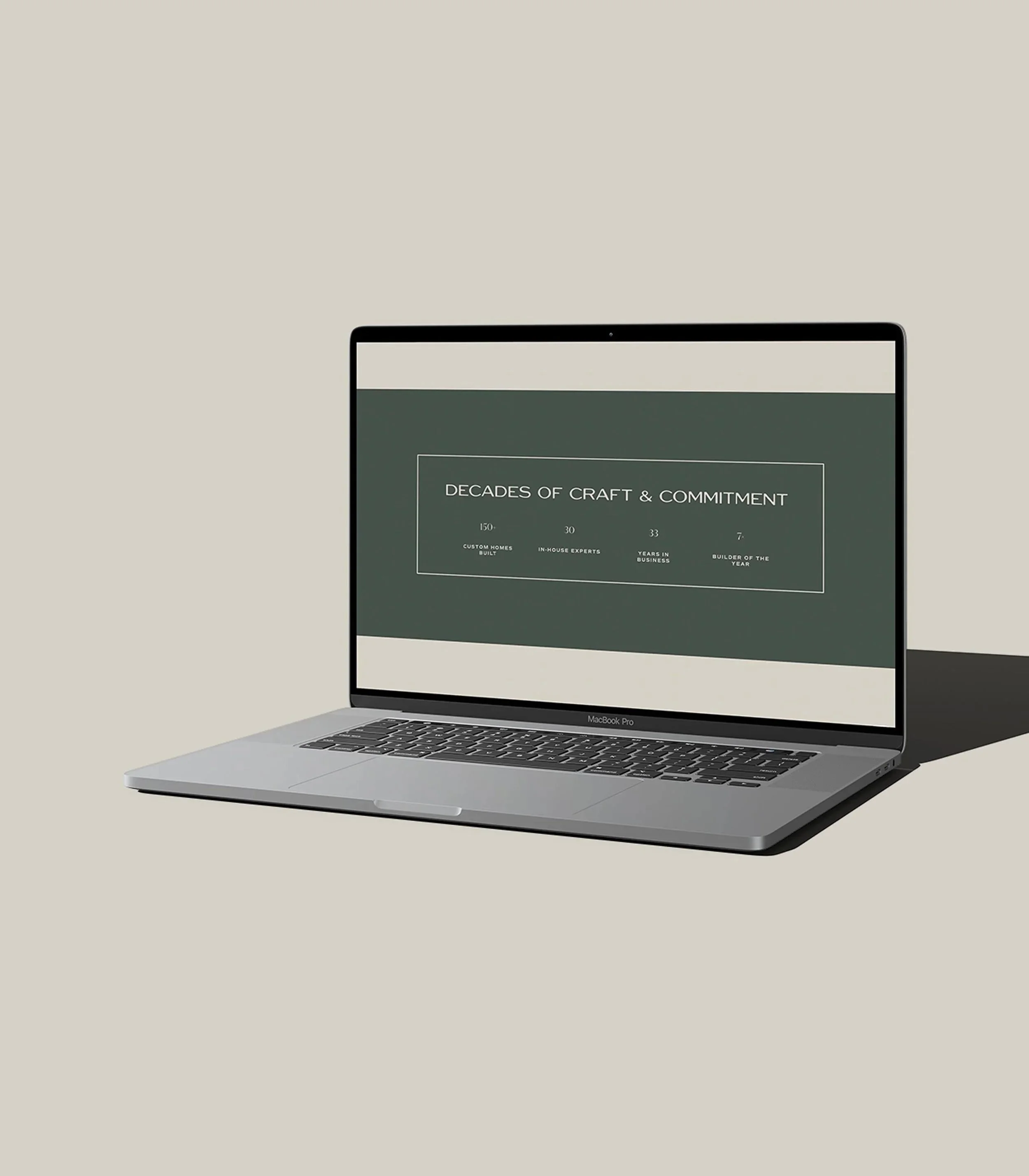 laptop displaying the Hoyt Homes website design