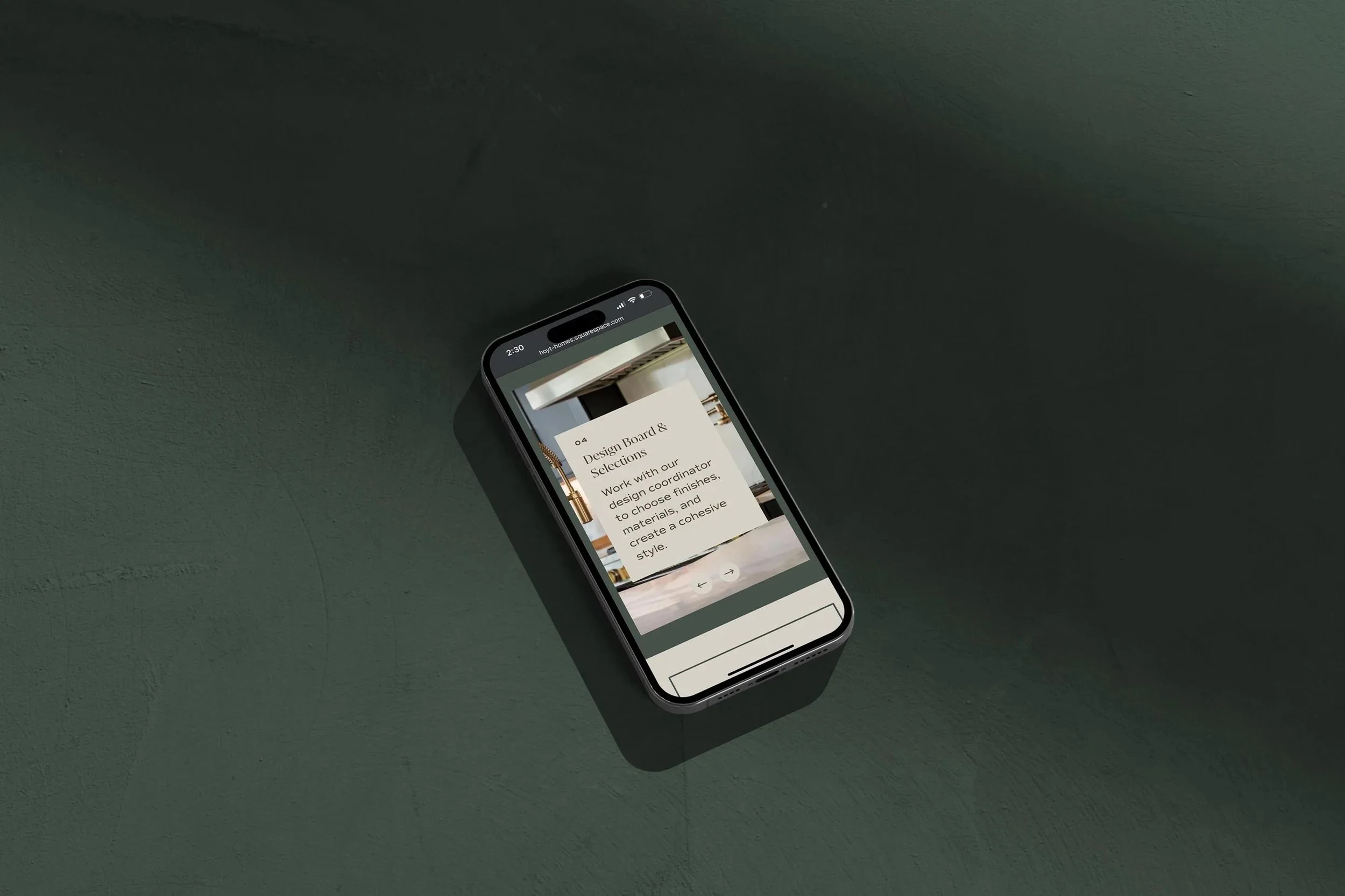 iPhone displaying the Hoyt Homes website design