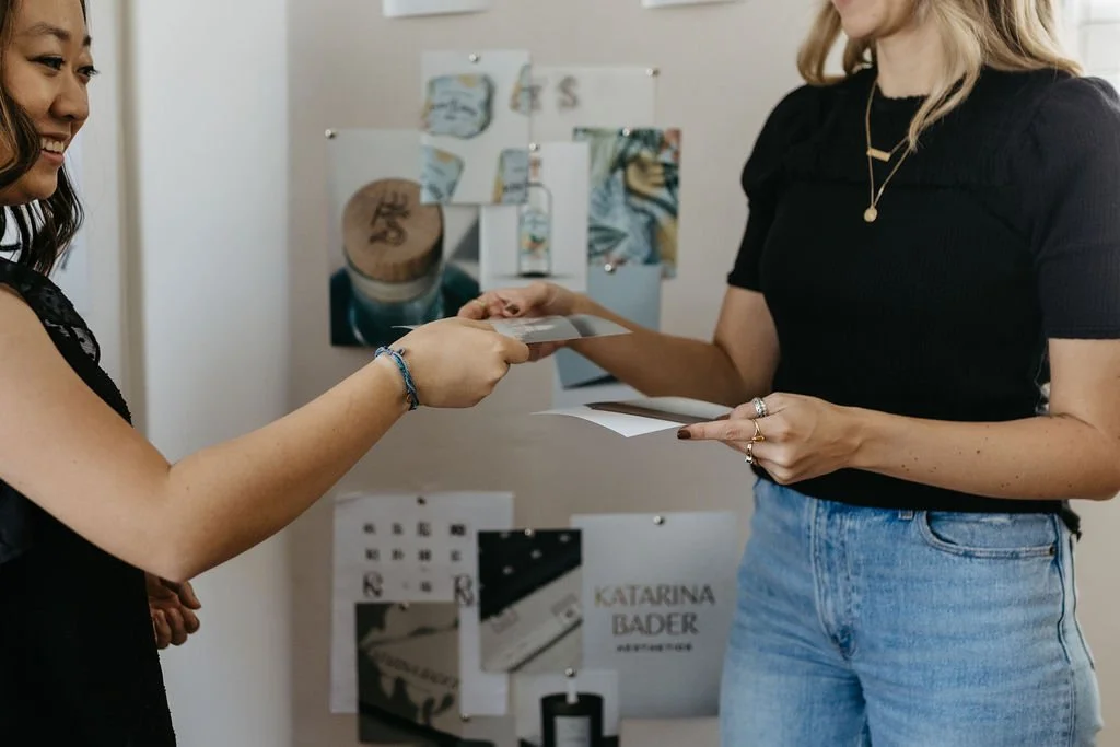 brand designers exchanging color swatches