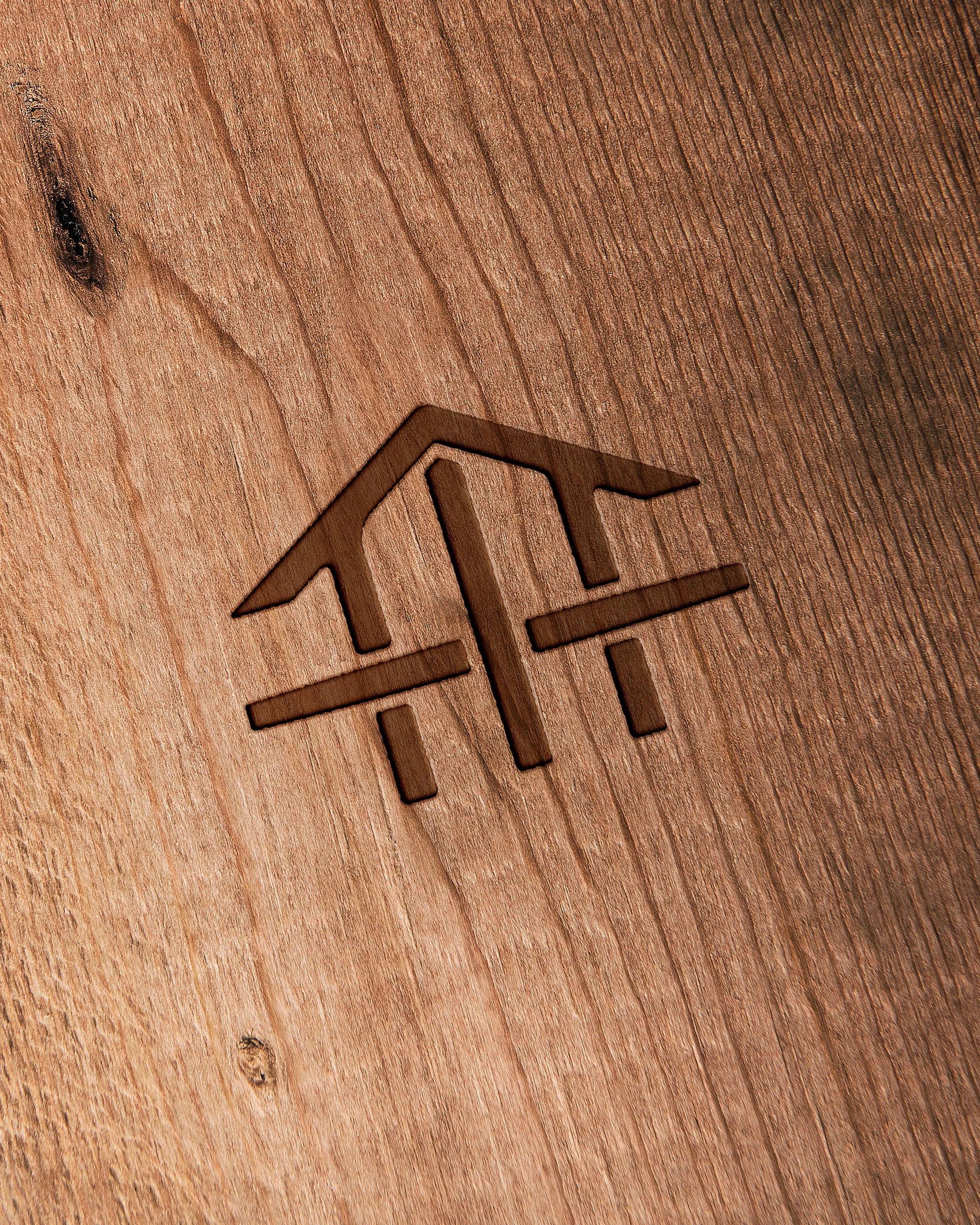 Hoyt Homes icon on custom cutting board