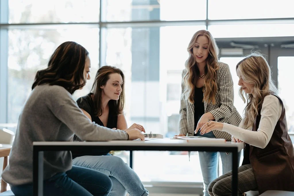 web designers meeting around a table