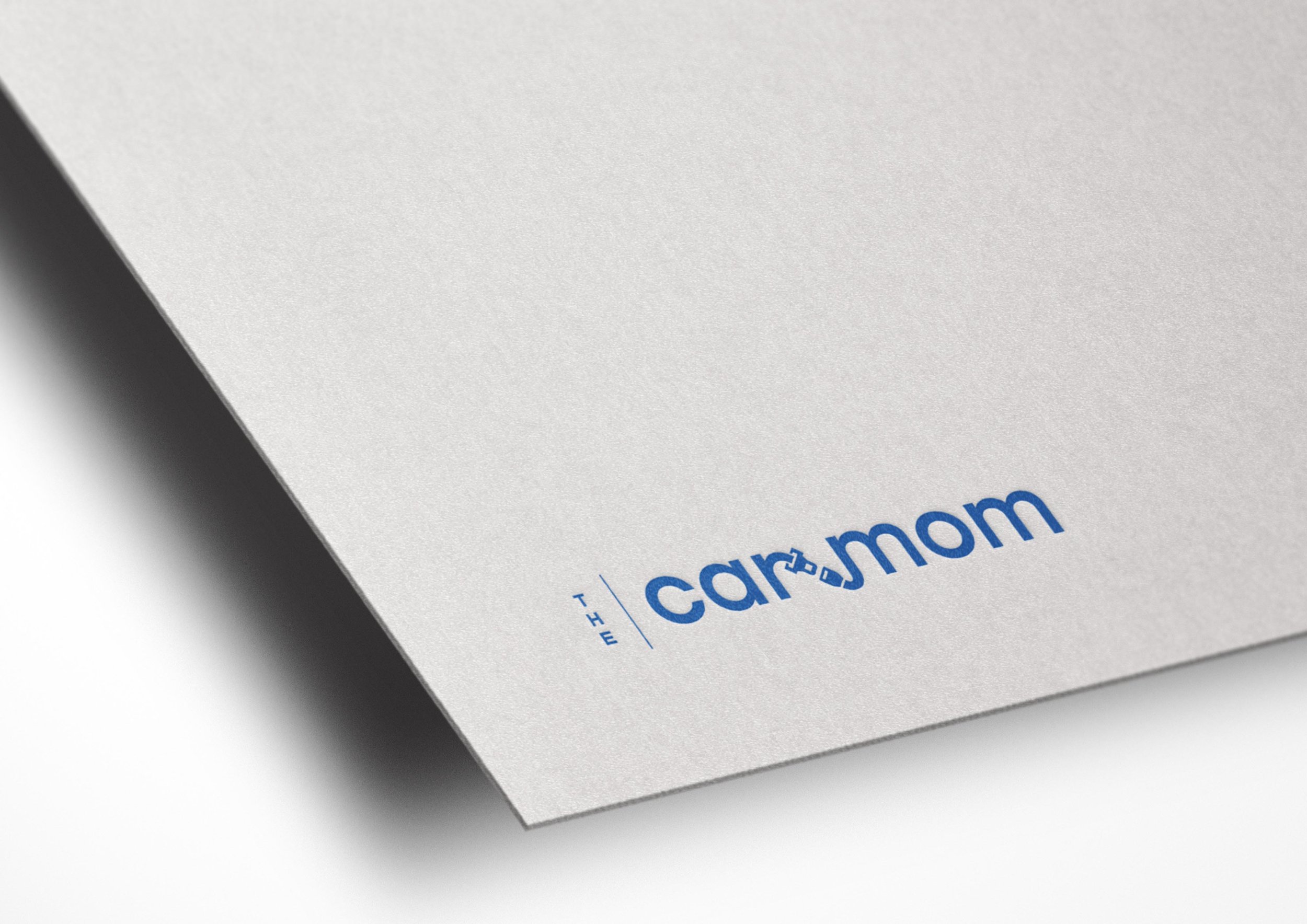 the car mom logo on white stationery