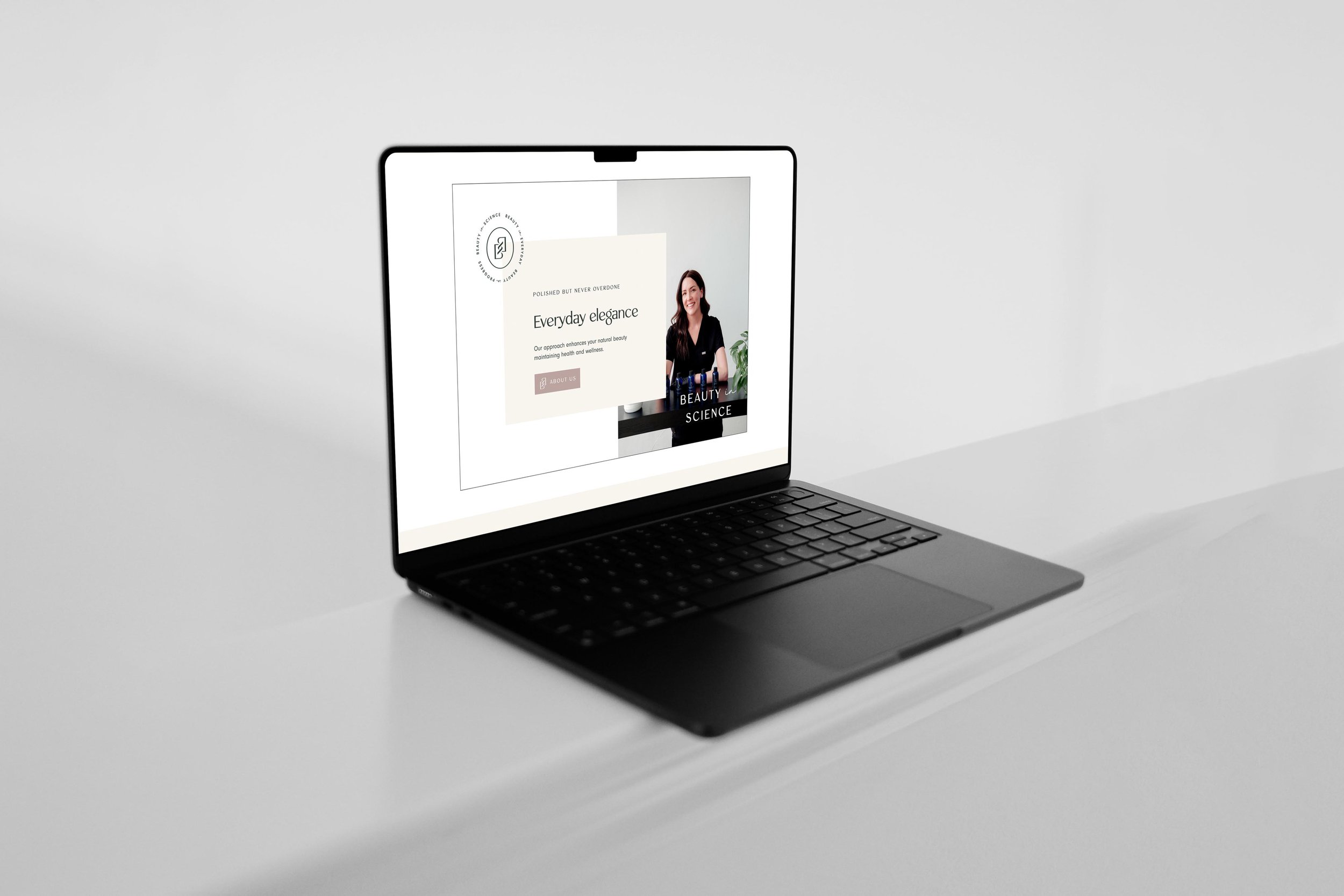 laptop displaying the Beauty in Science medspa website homepage