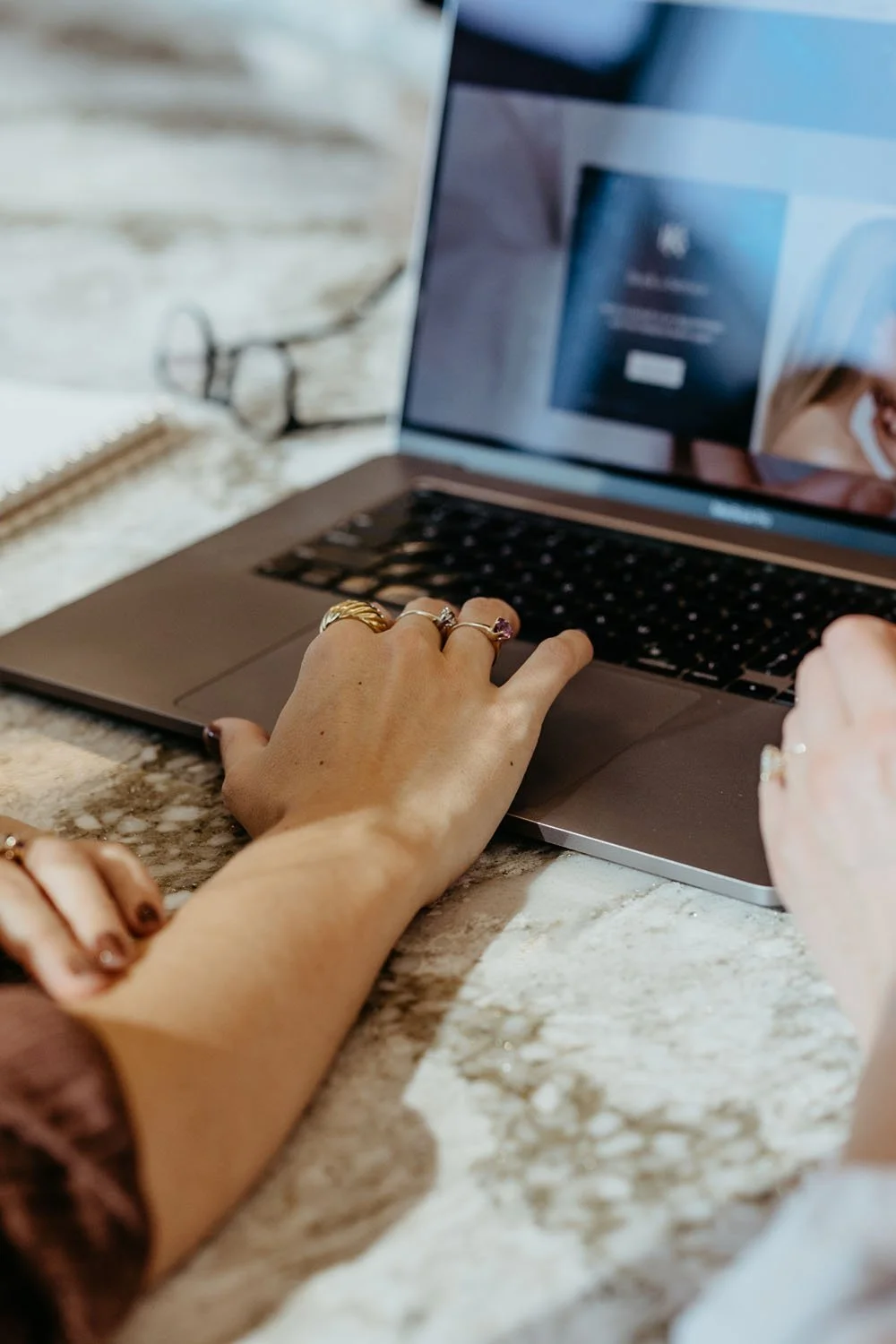 web designer working on laptop