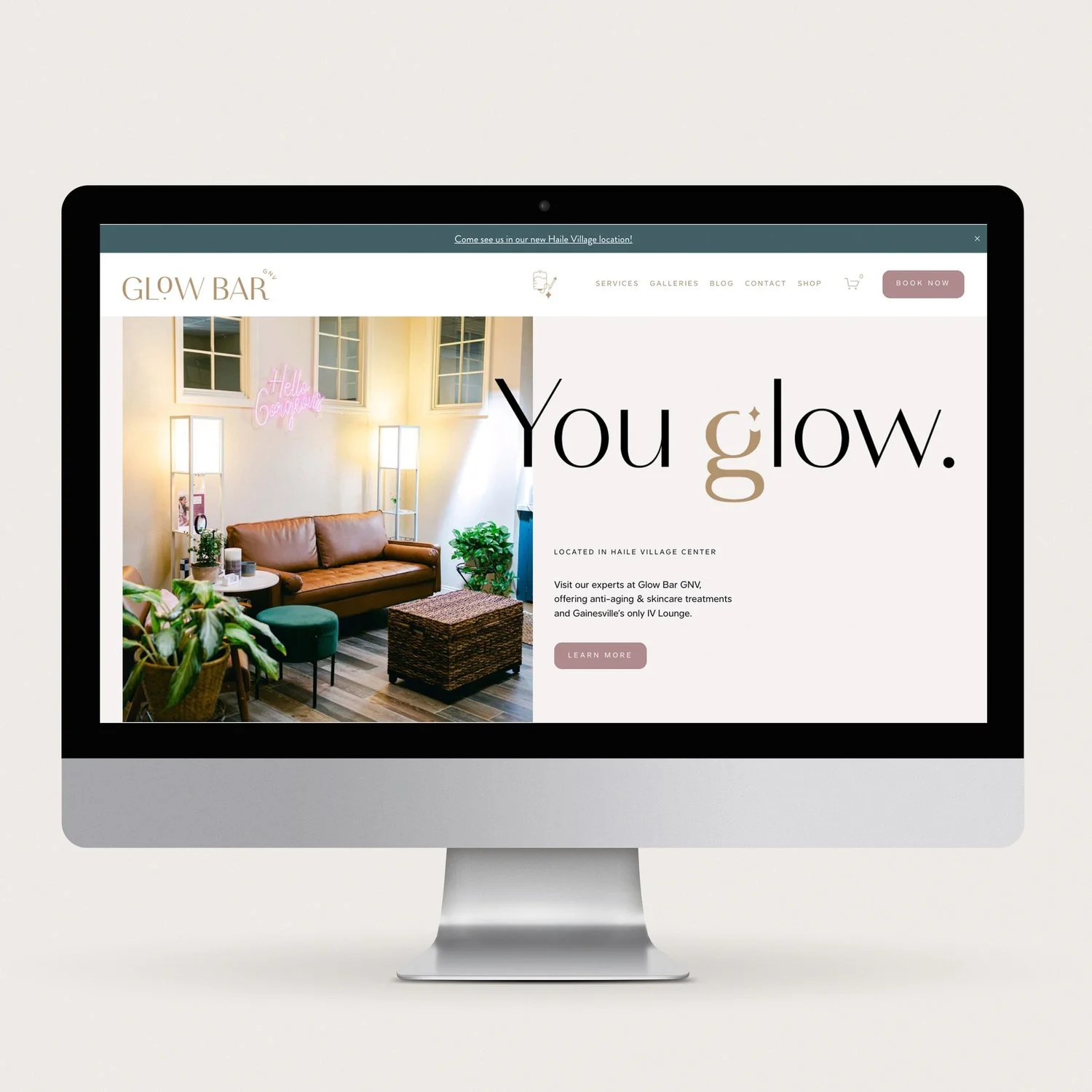 desktop computer showing the Glow Bar website homepage