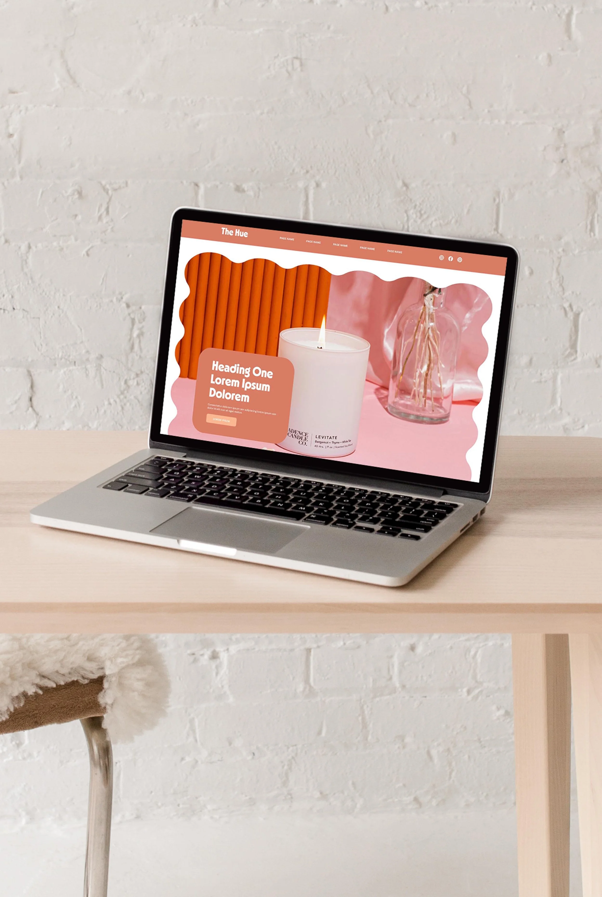 homepage hero section, mocked up on a laptop