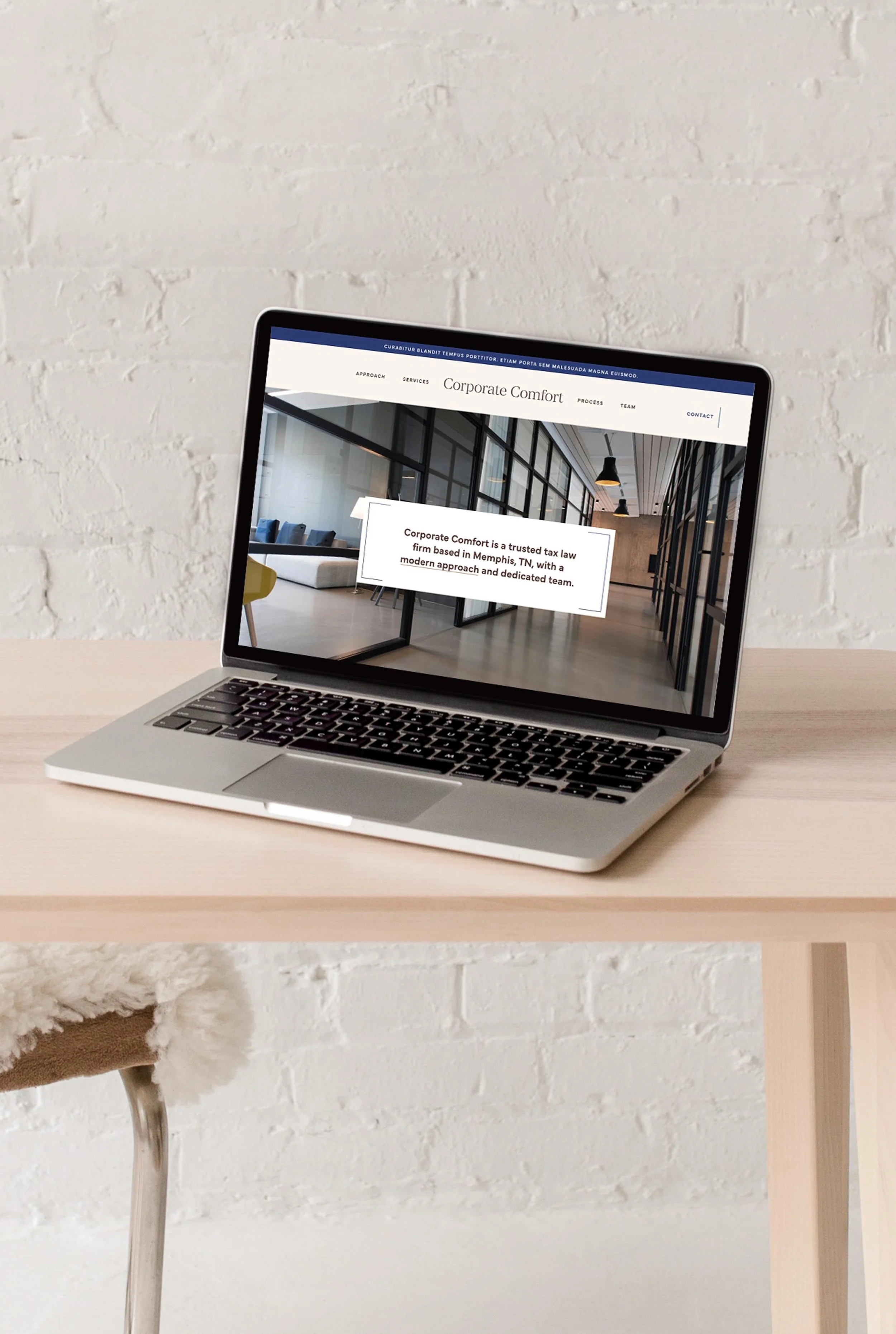 homepage hero section, mocked up on a laptop