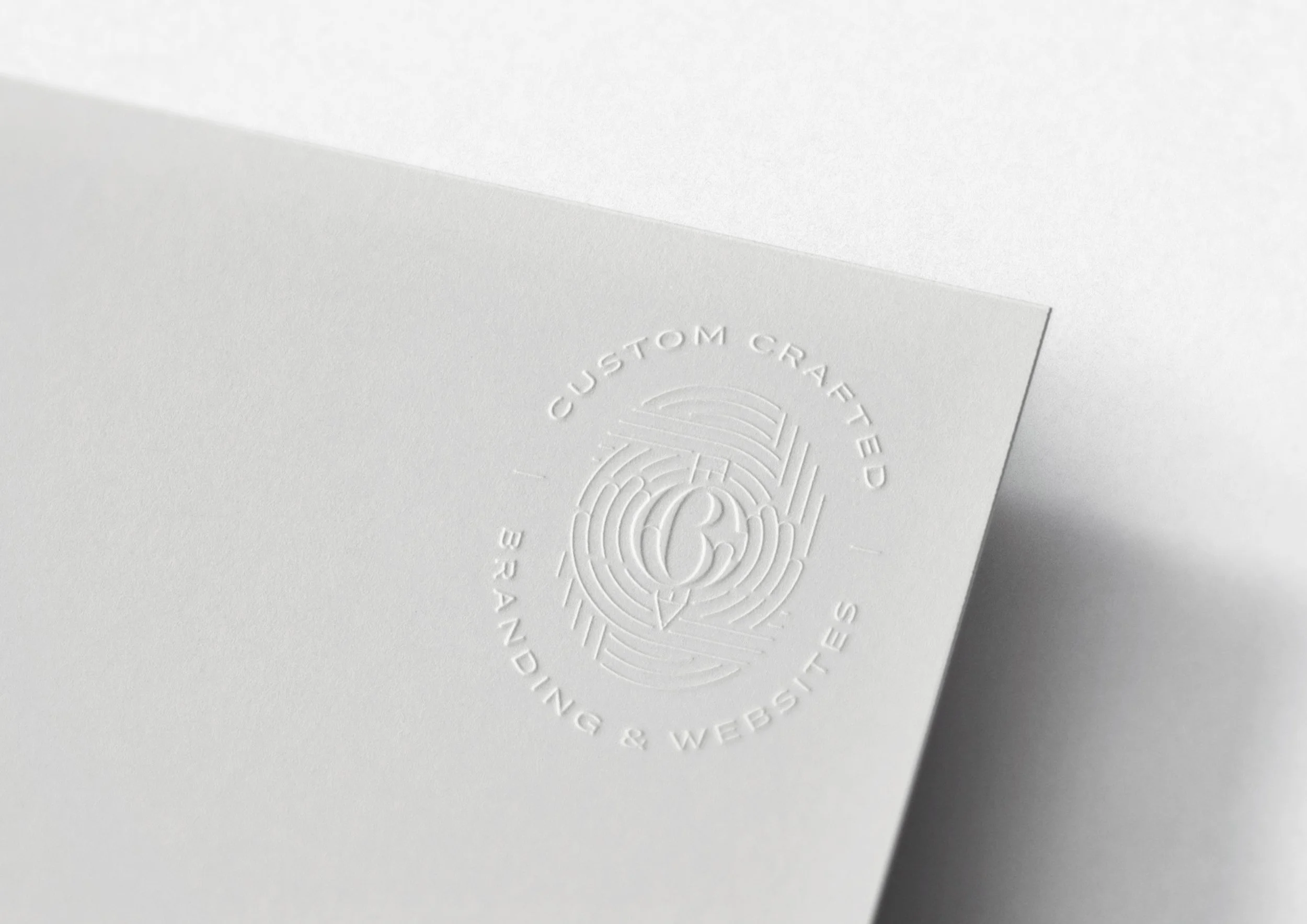 Creme Brands logo embossed on cardstock