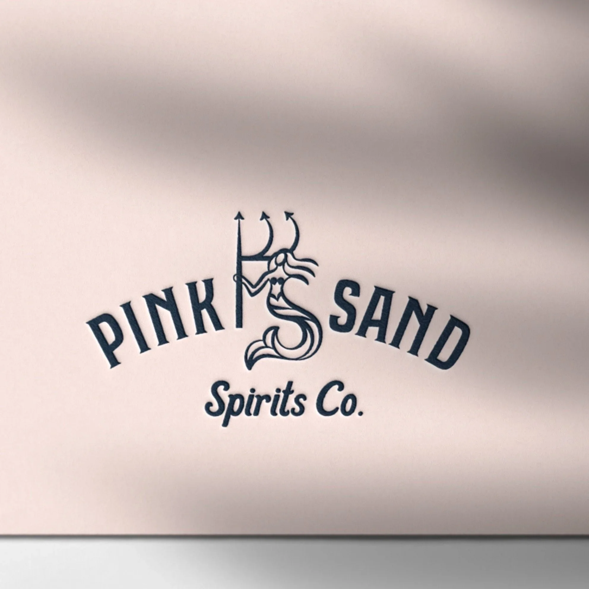 Pink Sand logo embossed on stationery