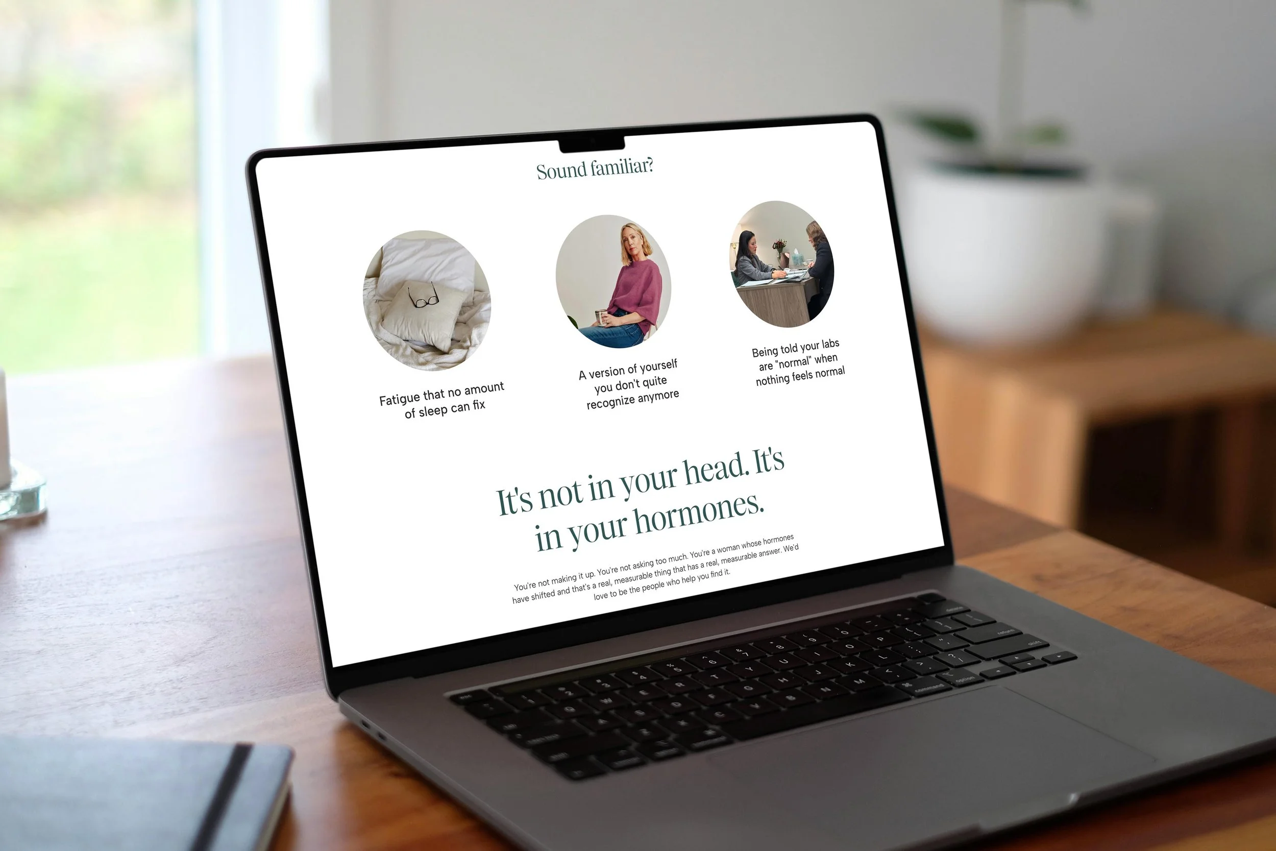 laptop displaying Her Nova Wellness' website homepage