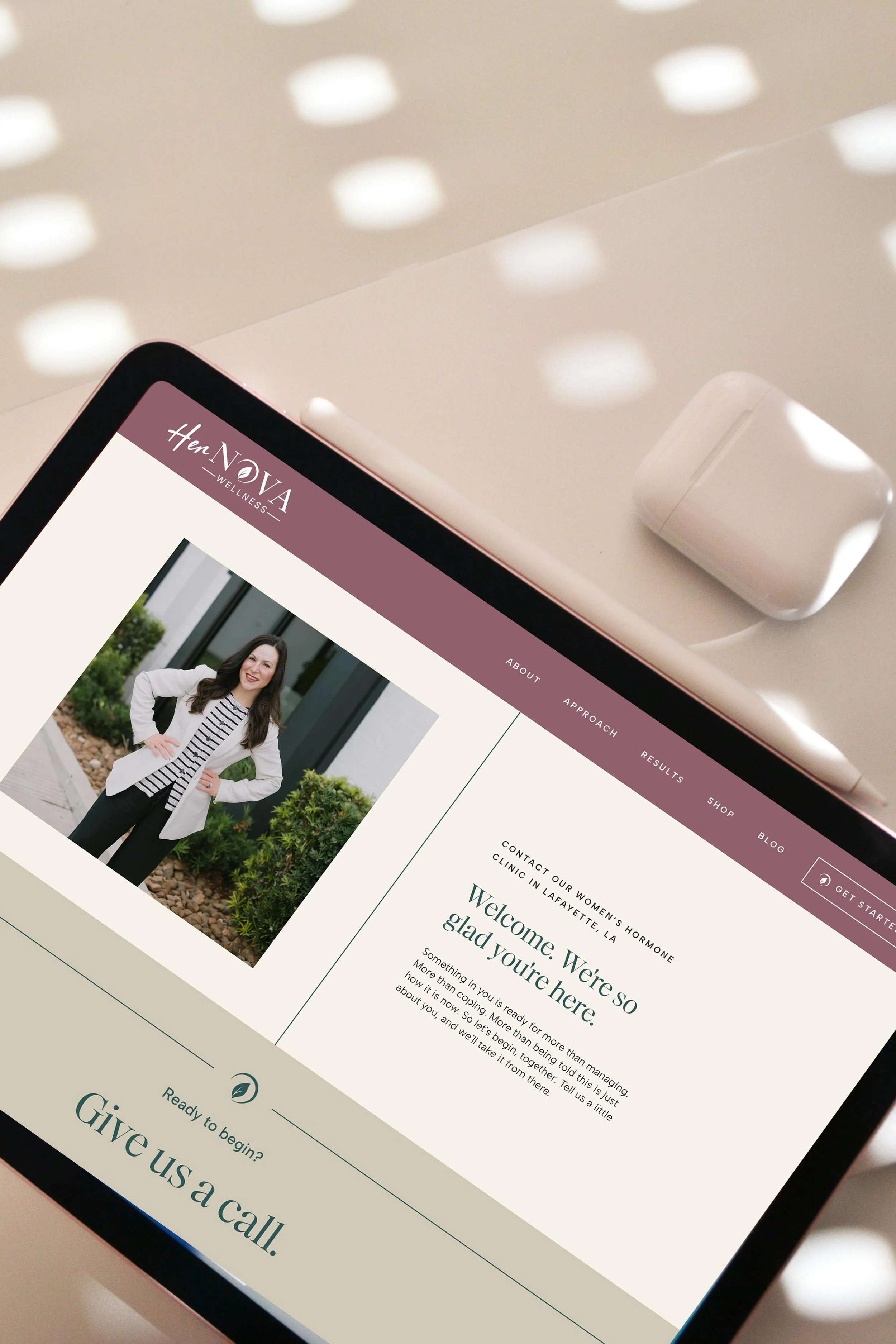 iPad displaying Her Nova Wellness' website homepage