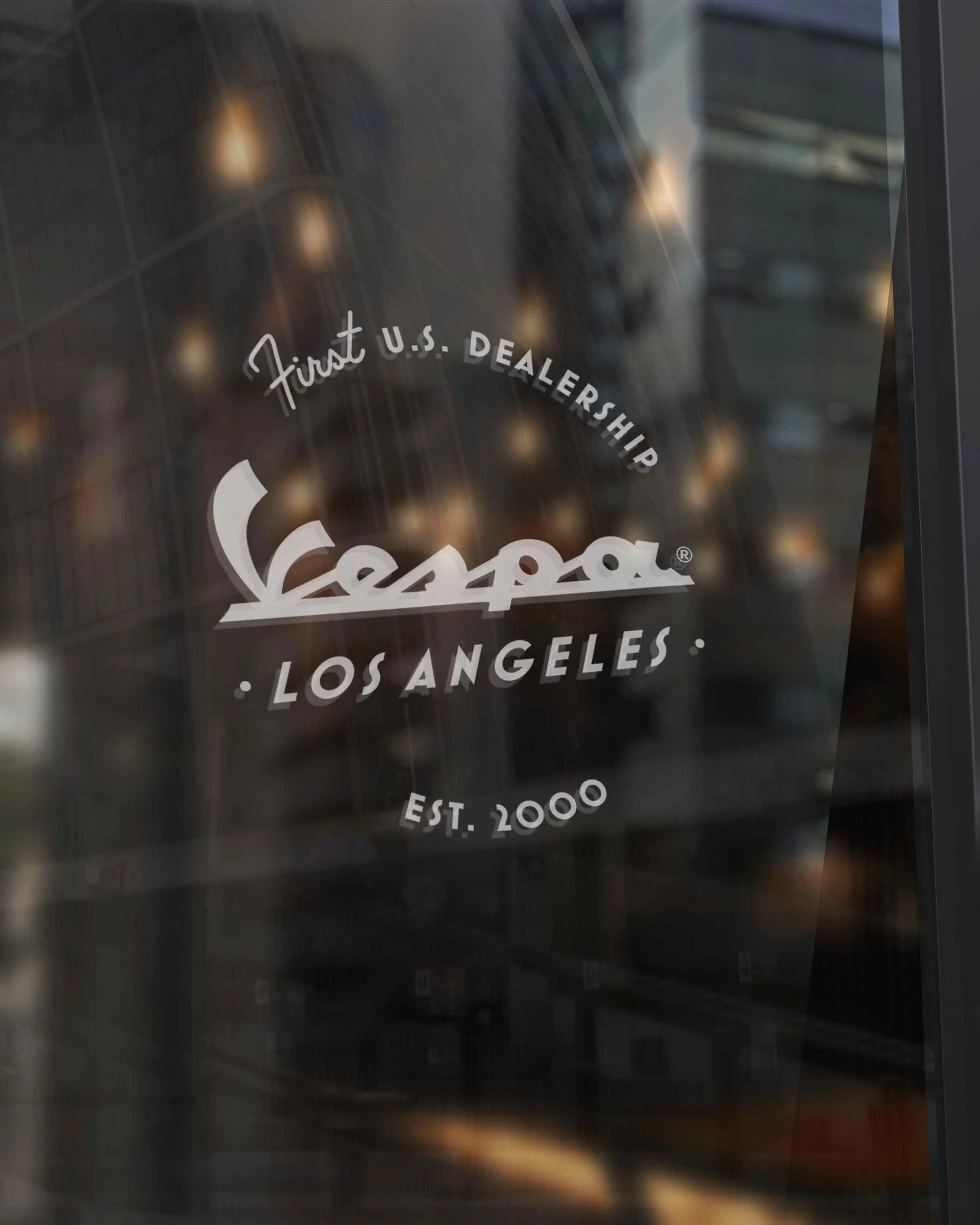 Vespa Los Angeles storefront window sign