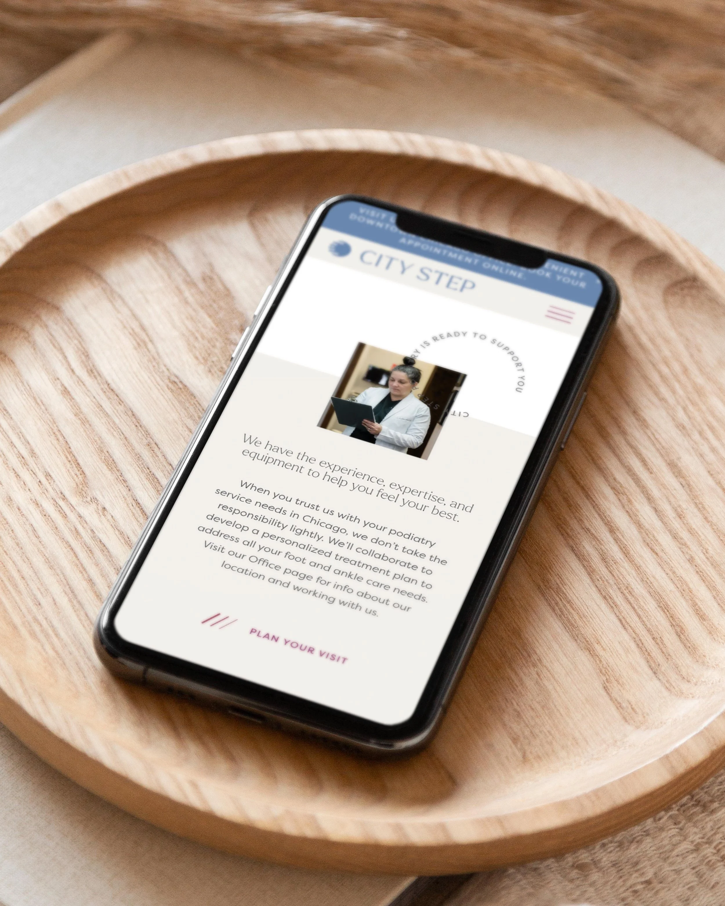 City Step Podiatry Office website design on a mobile phone