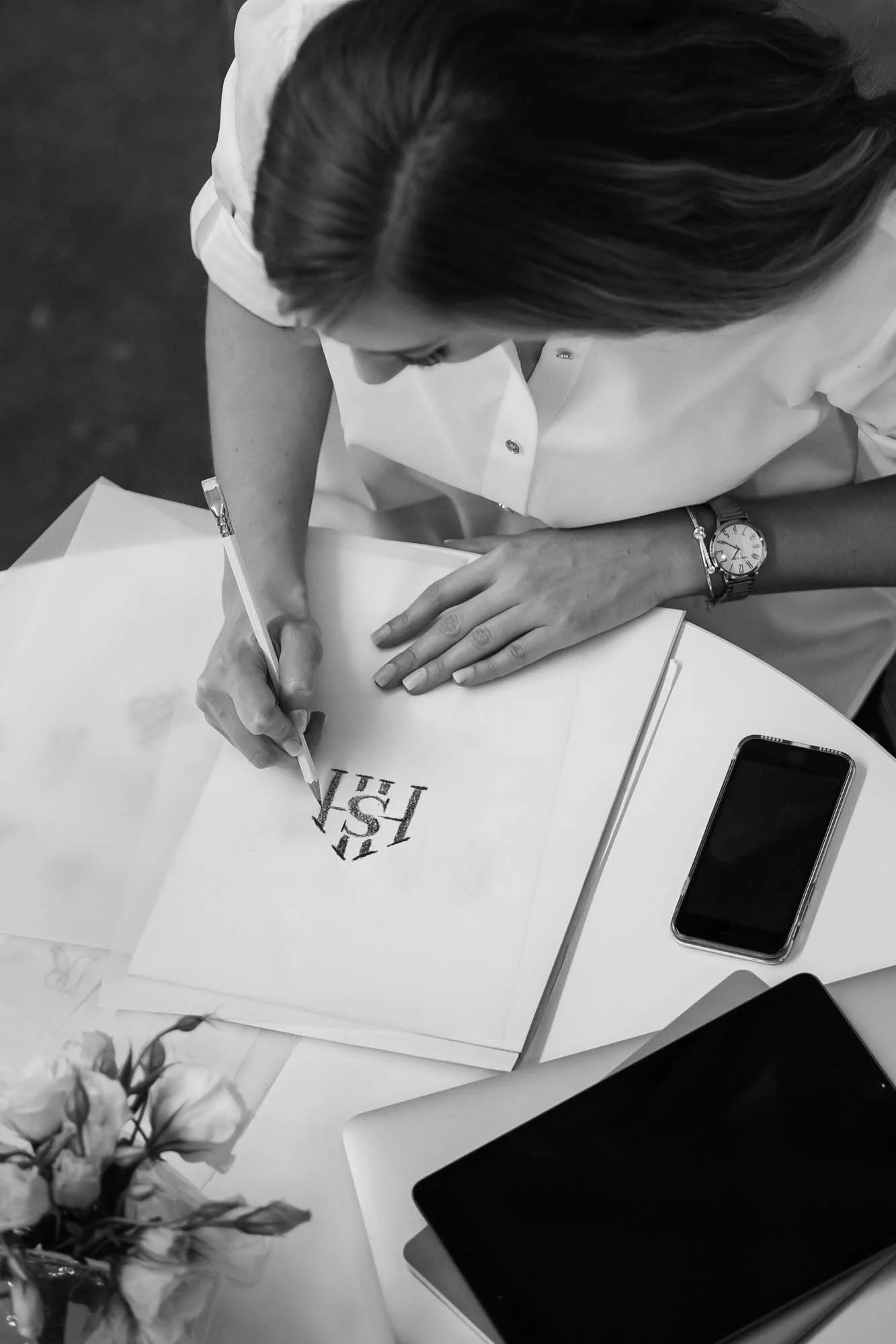 brand designer drawing a logo