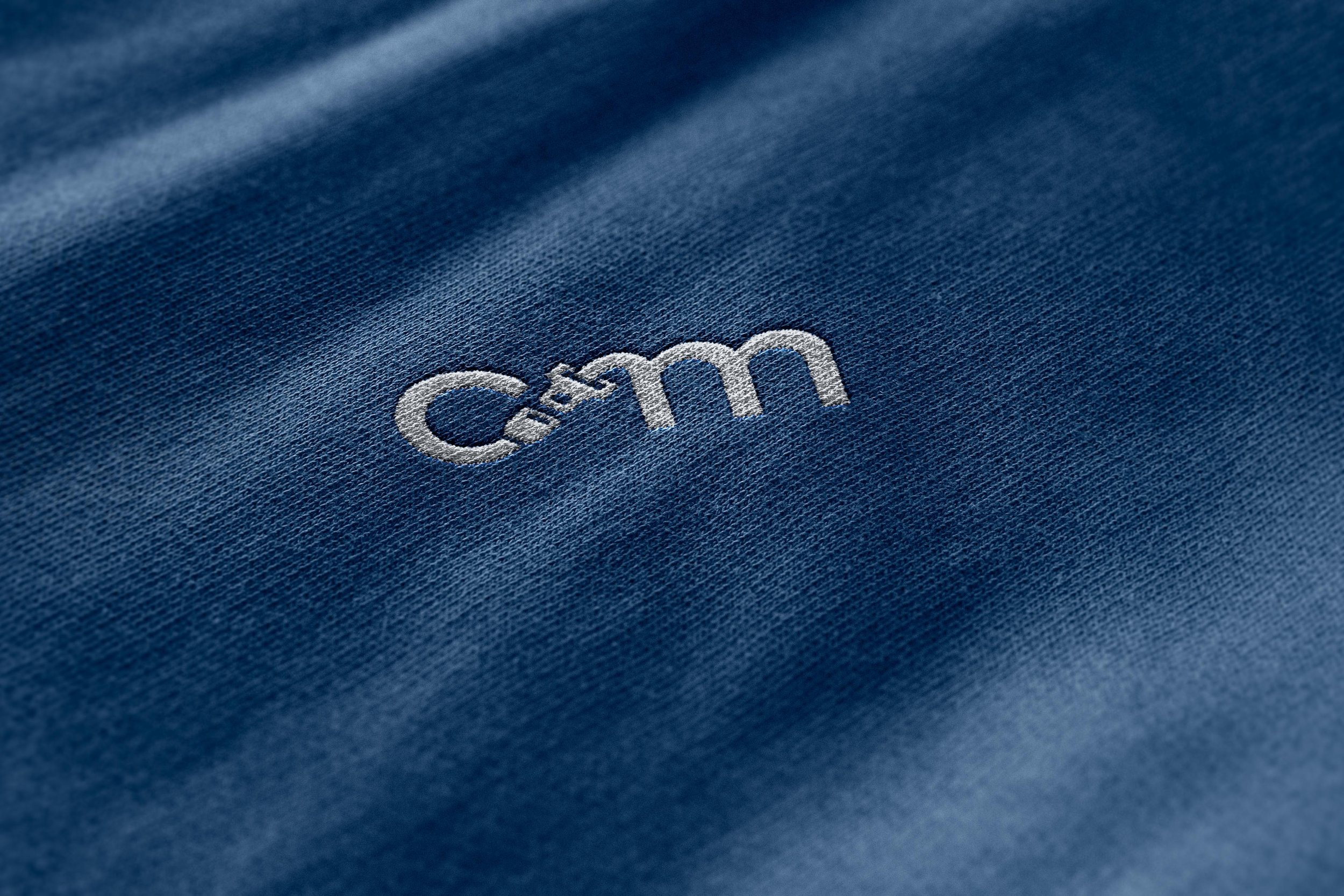the car mom logo embroidered onto a sweatshirt