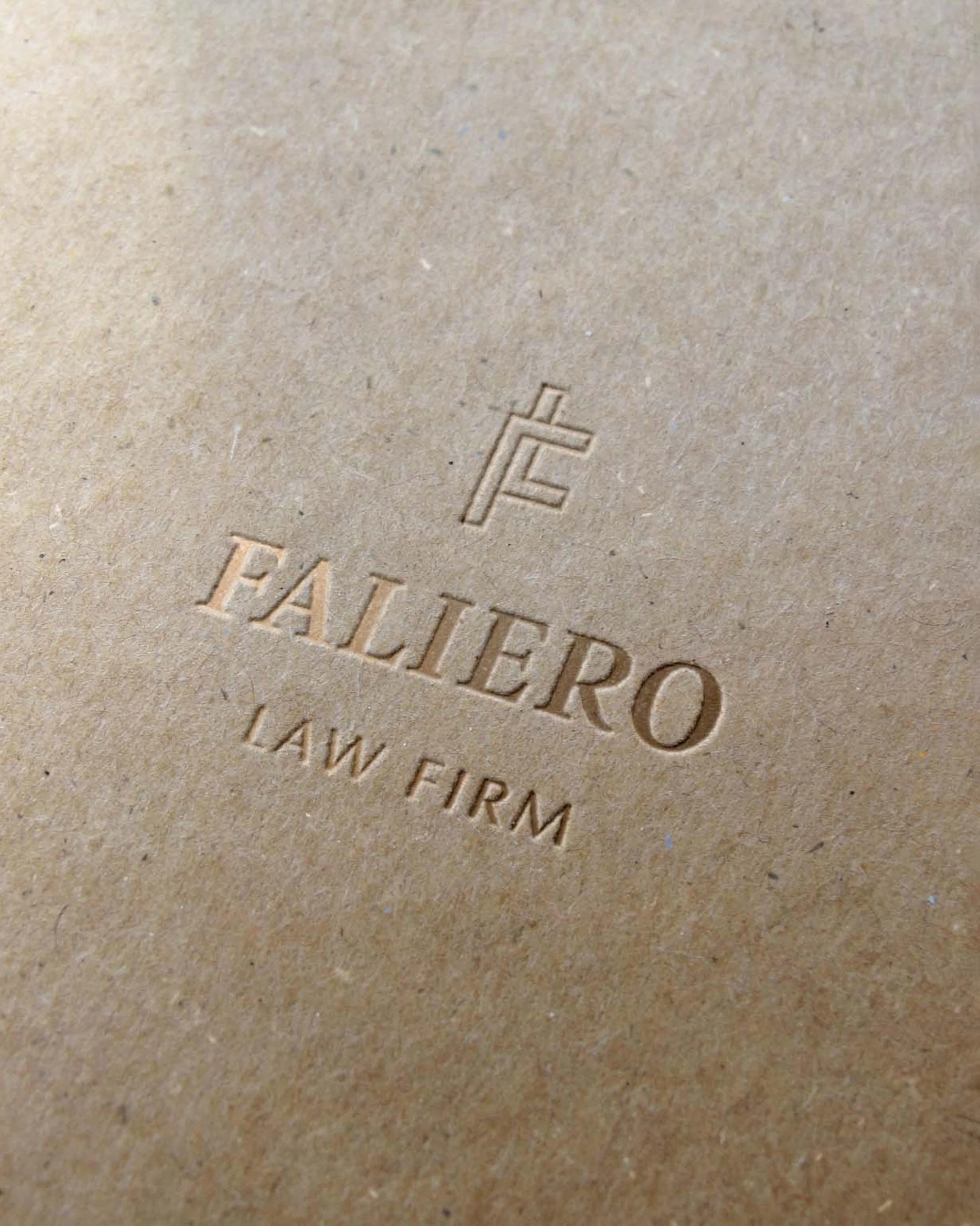 Faliero Law Firm logo foil printed on stationery