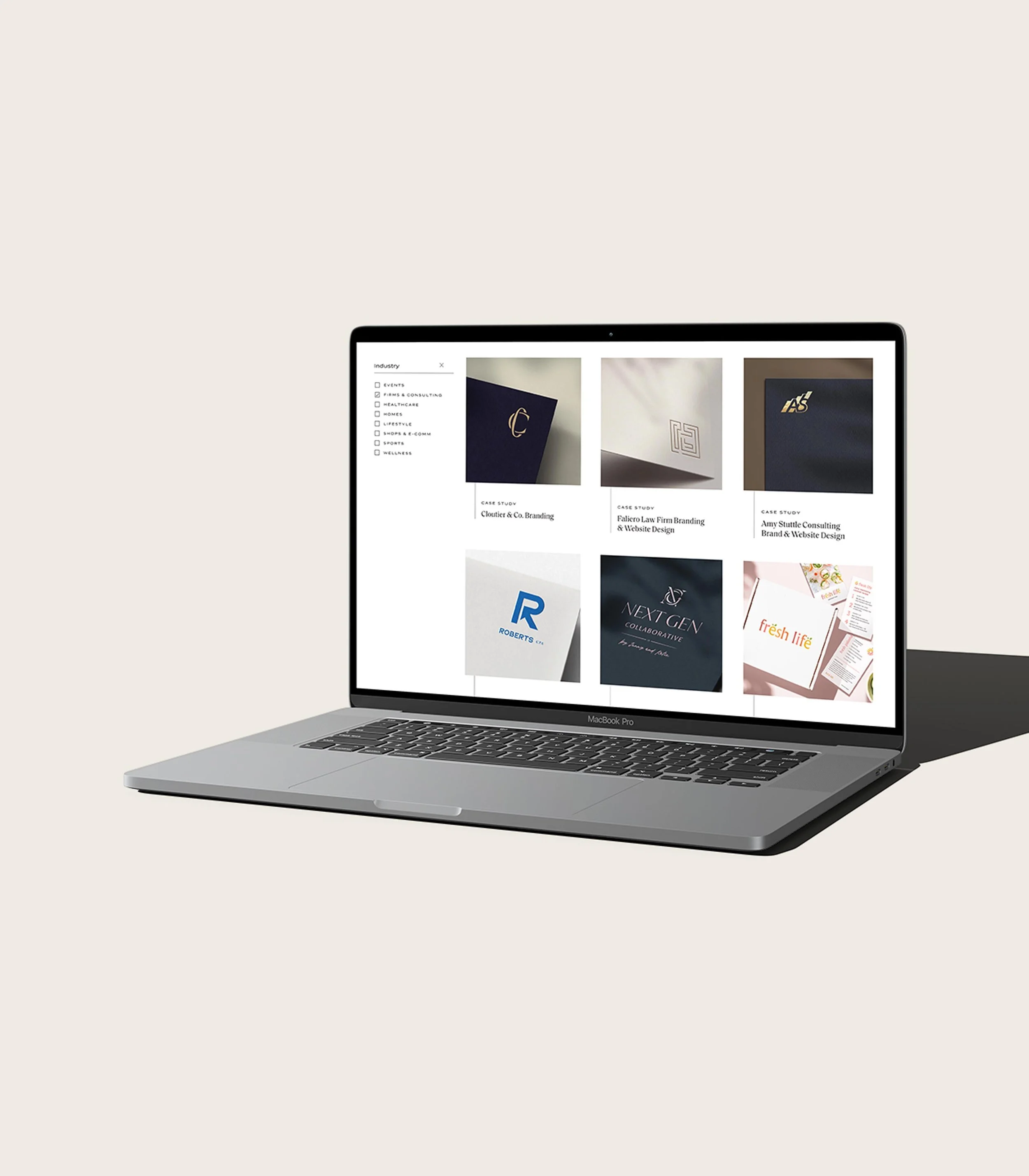 laptop featuring portfolio filtering on the new Creme Brands site