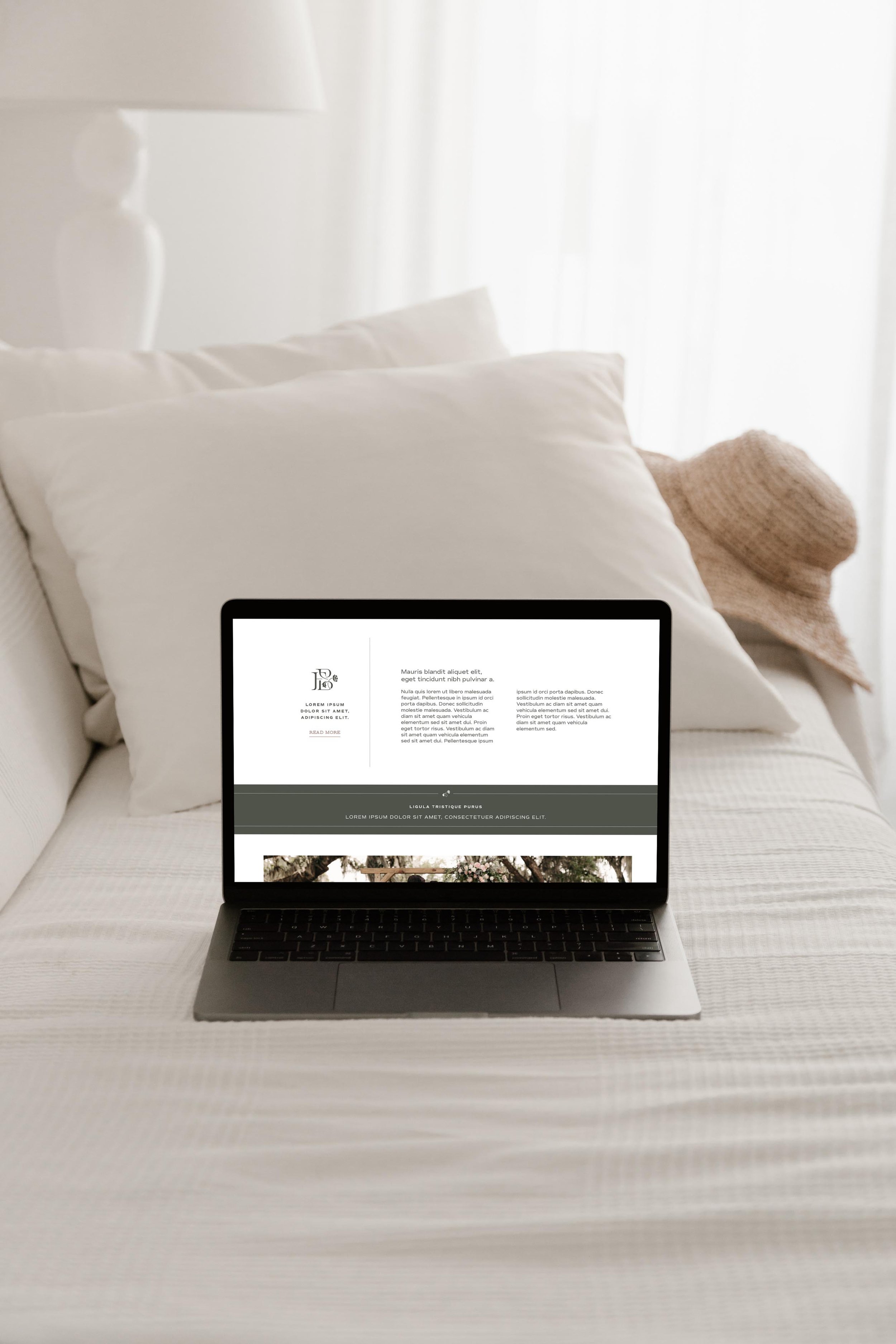 laptop displaying the Feather + Bloom website design