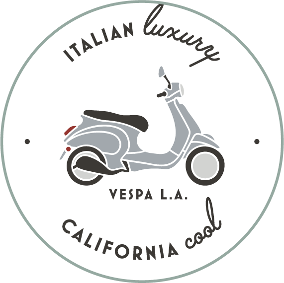 circular badge design with Vespa illustration and "Vespa L.A." text in the center, "Italian luxury/California cool" text hugging the inside of the circle