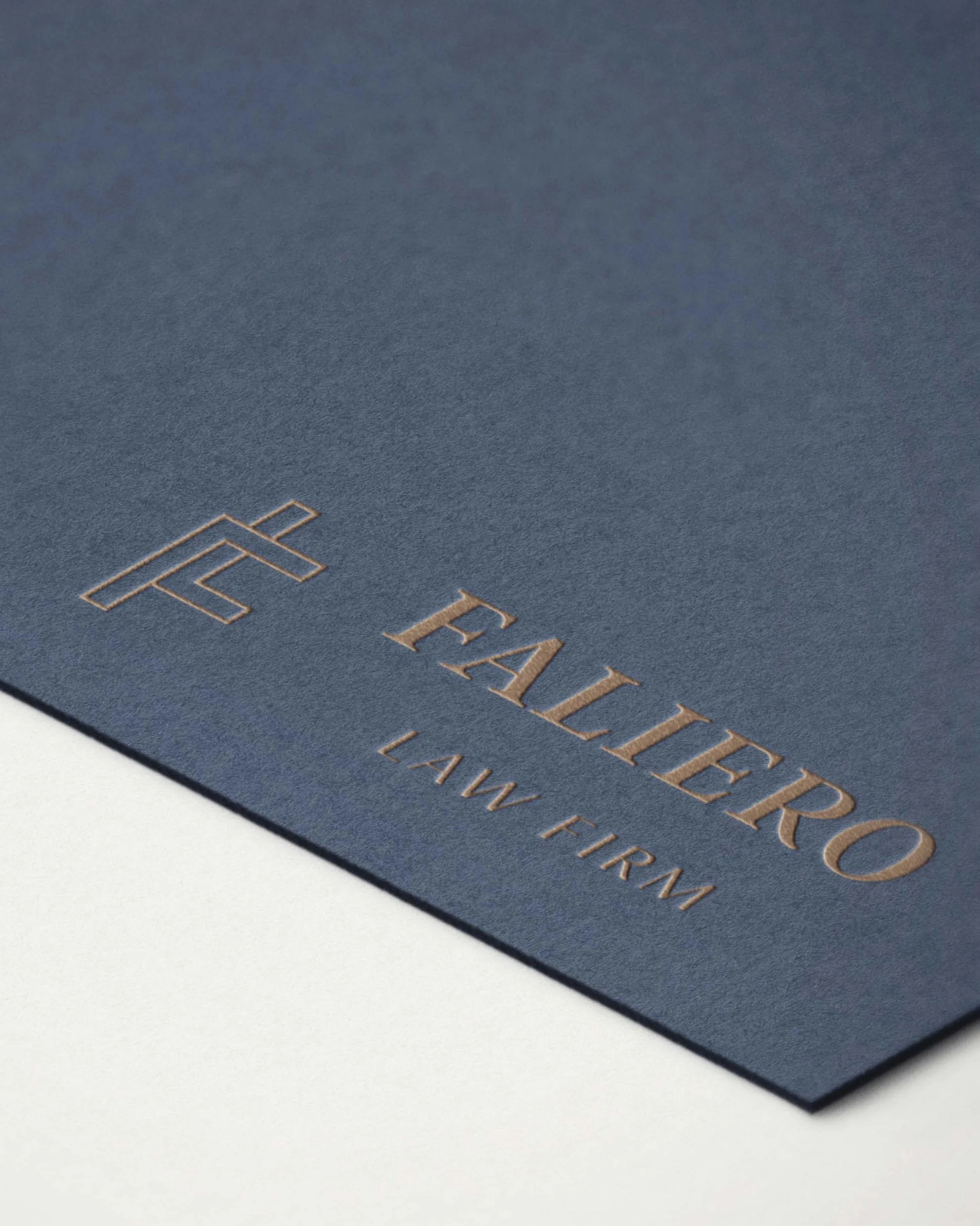 Faliero Law Firm logo embossed on stationery