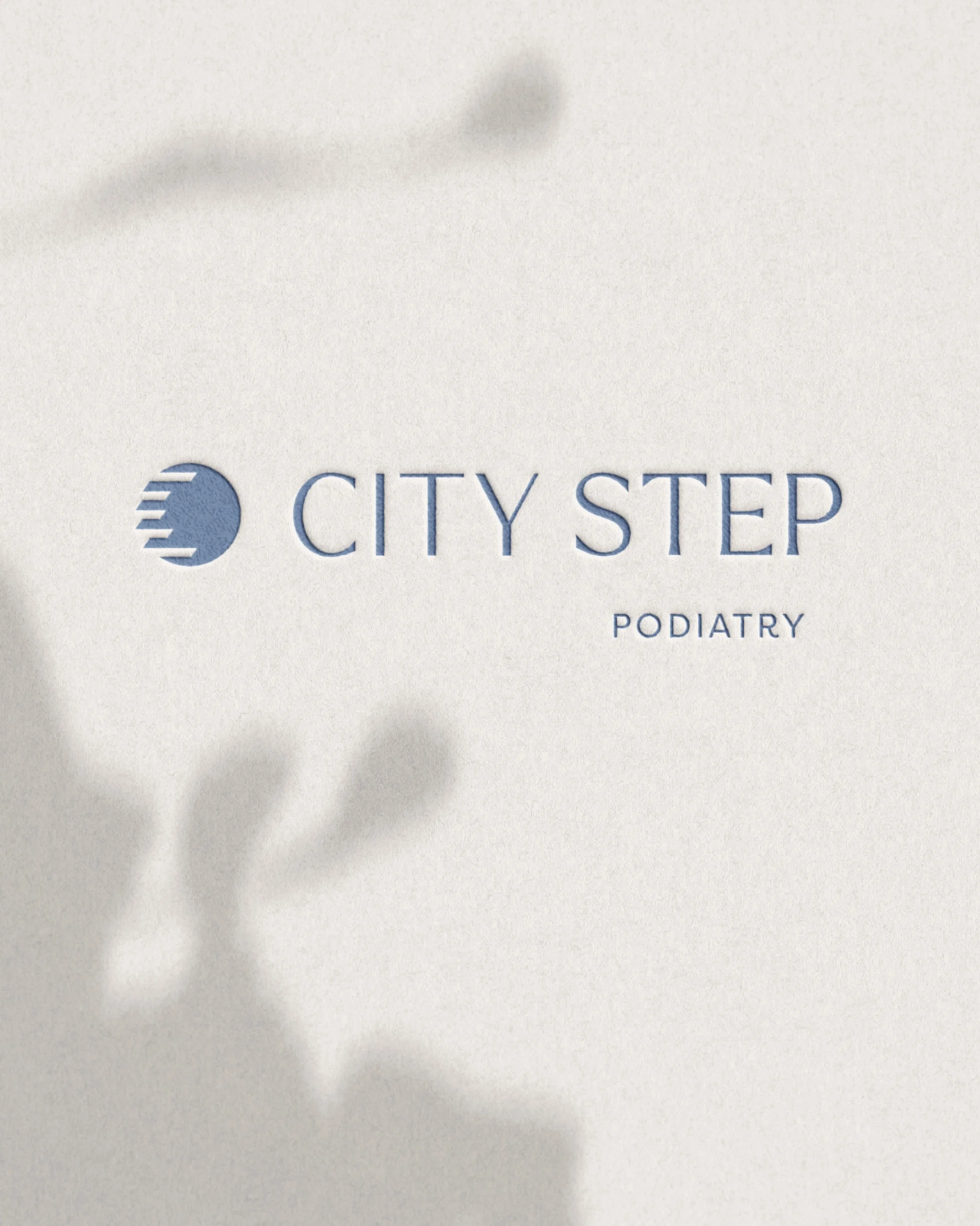City Step Podiatry logo embossed on stationery