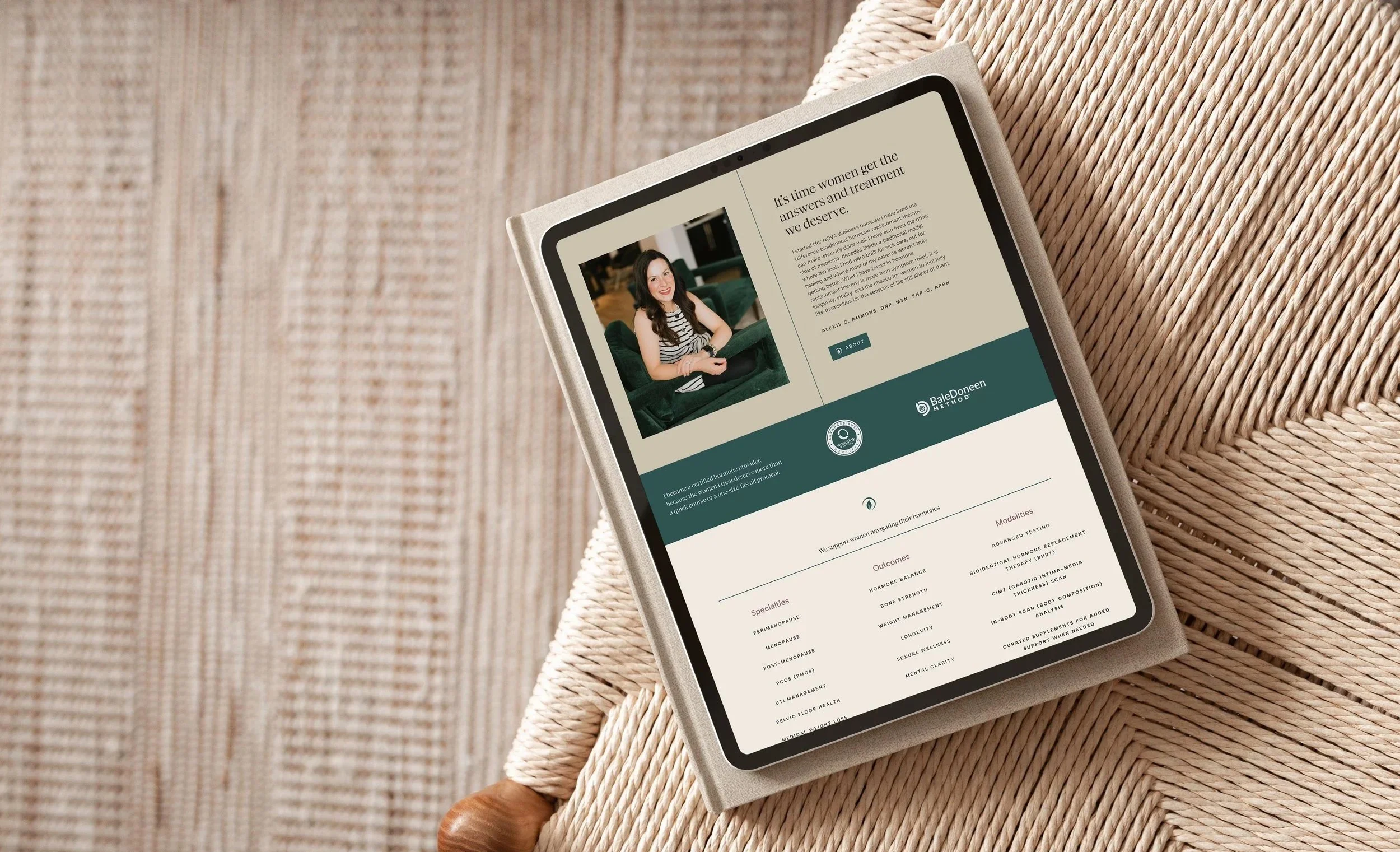 iPad displaying Her Nova Wellness' website homepage