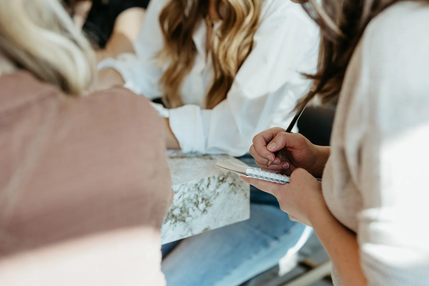 web designer taking notes